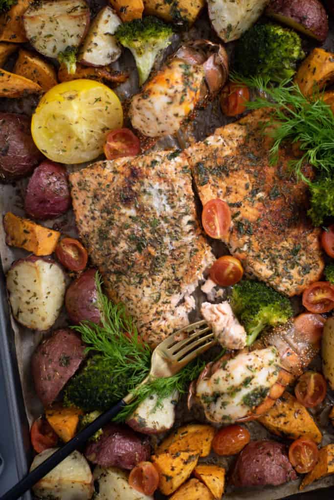 Sheet Pan Garlic Herb Salmon, Lobster, + Veggies