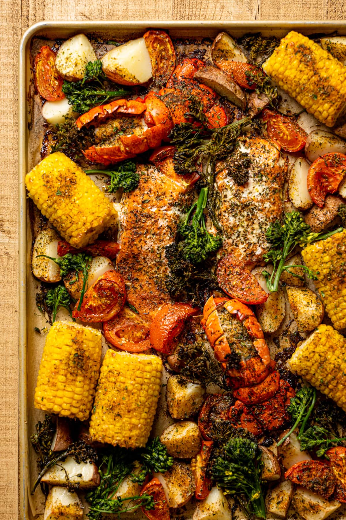 Sheet Pan Garlic Herb Salmon, Lobster, + Veggies