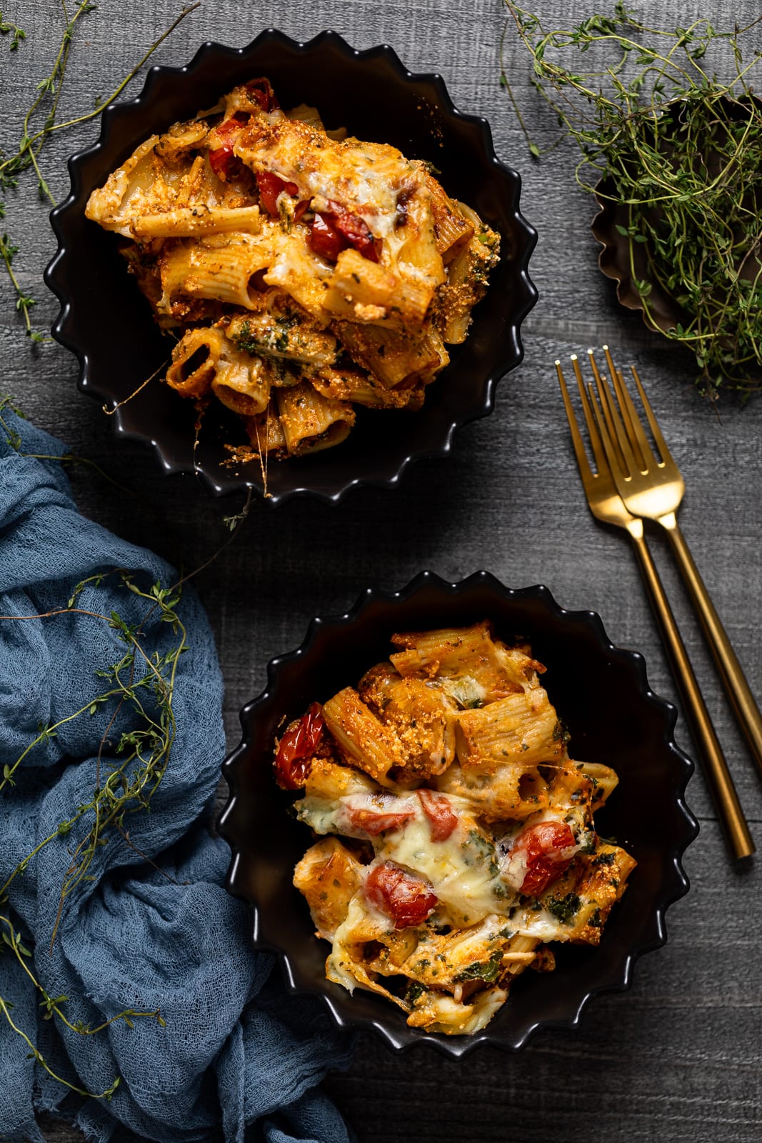 Two bowls of Meatless Baked Ziti with Ricotta and Mozzarella