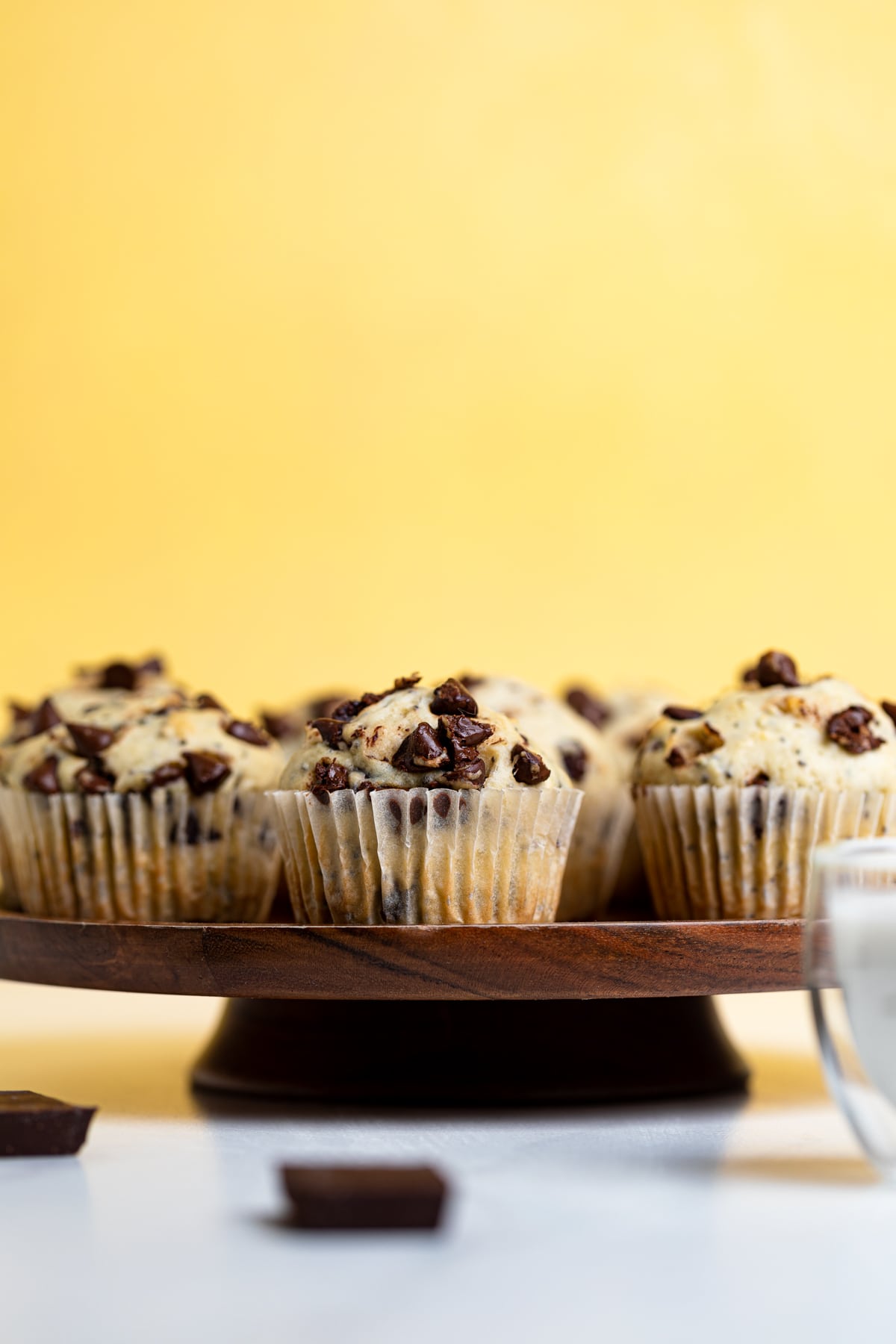 Chocolate Chip Chia Seed Energy Muffins on an elevated wooden platform