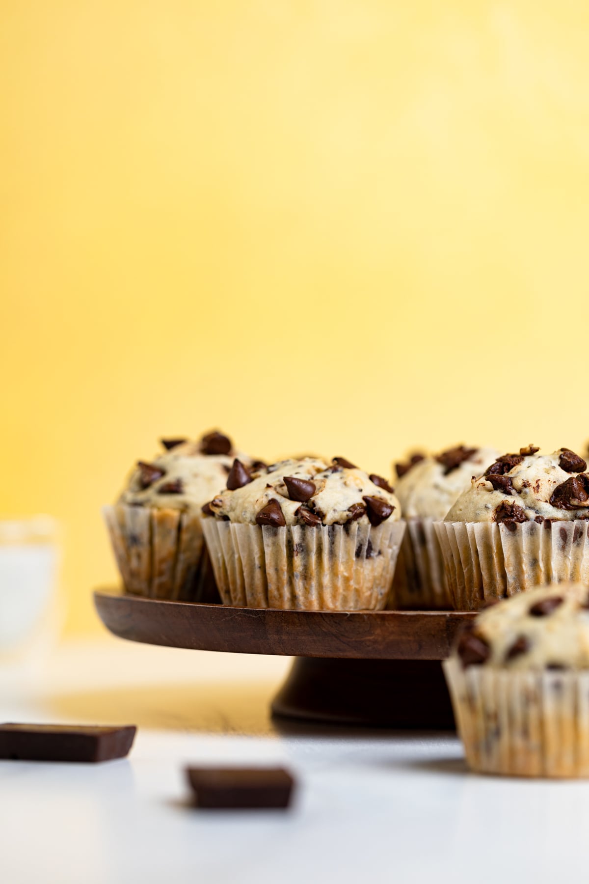 Chocolate Chip Chia Seed Energy Muffins on an elevated wooden platform