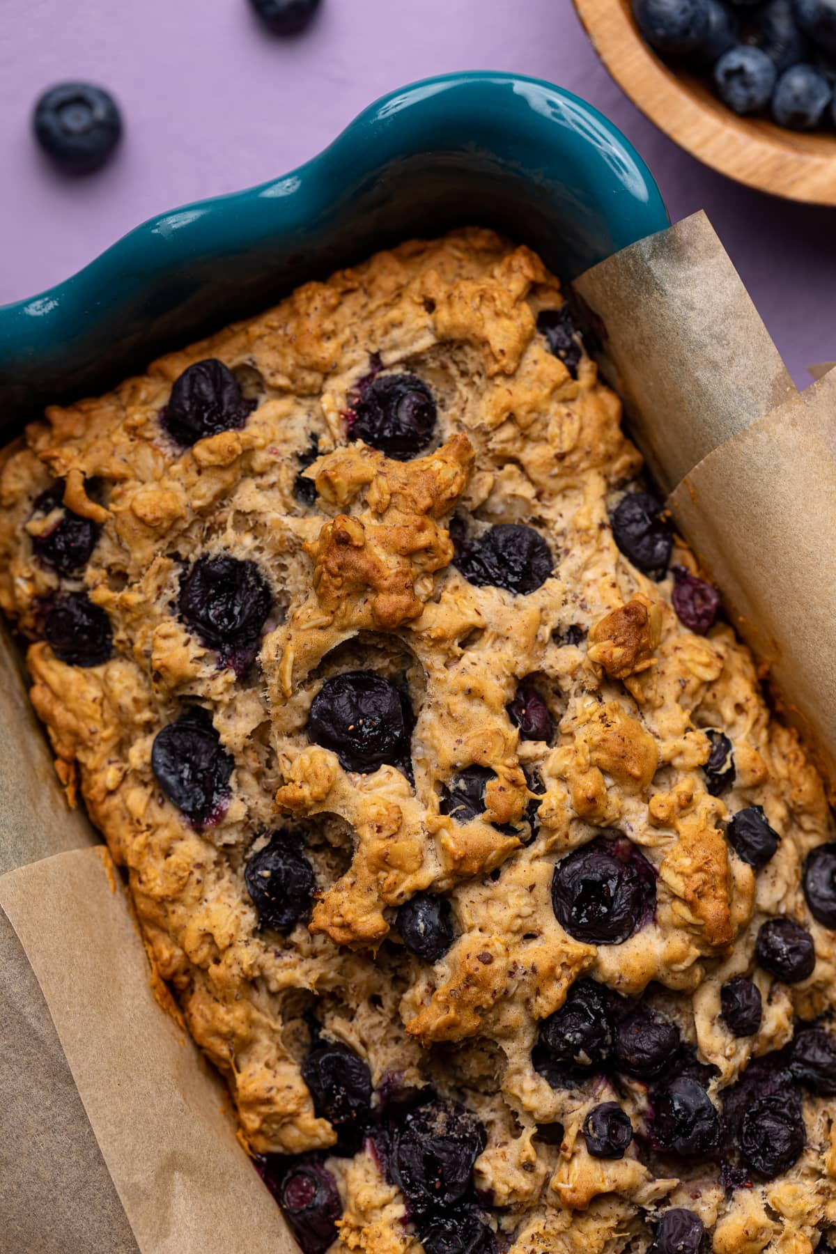 Blueberry Oatmeal Breakfast Bread in a bread pan.