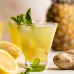 Small glass of Pineapple Ginger Turmeric Lemonade.