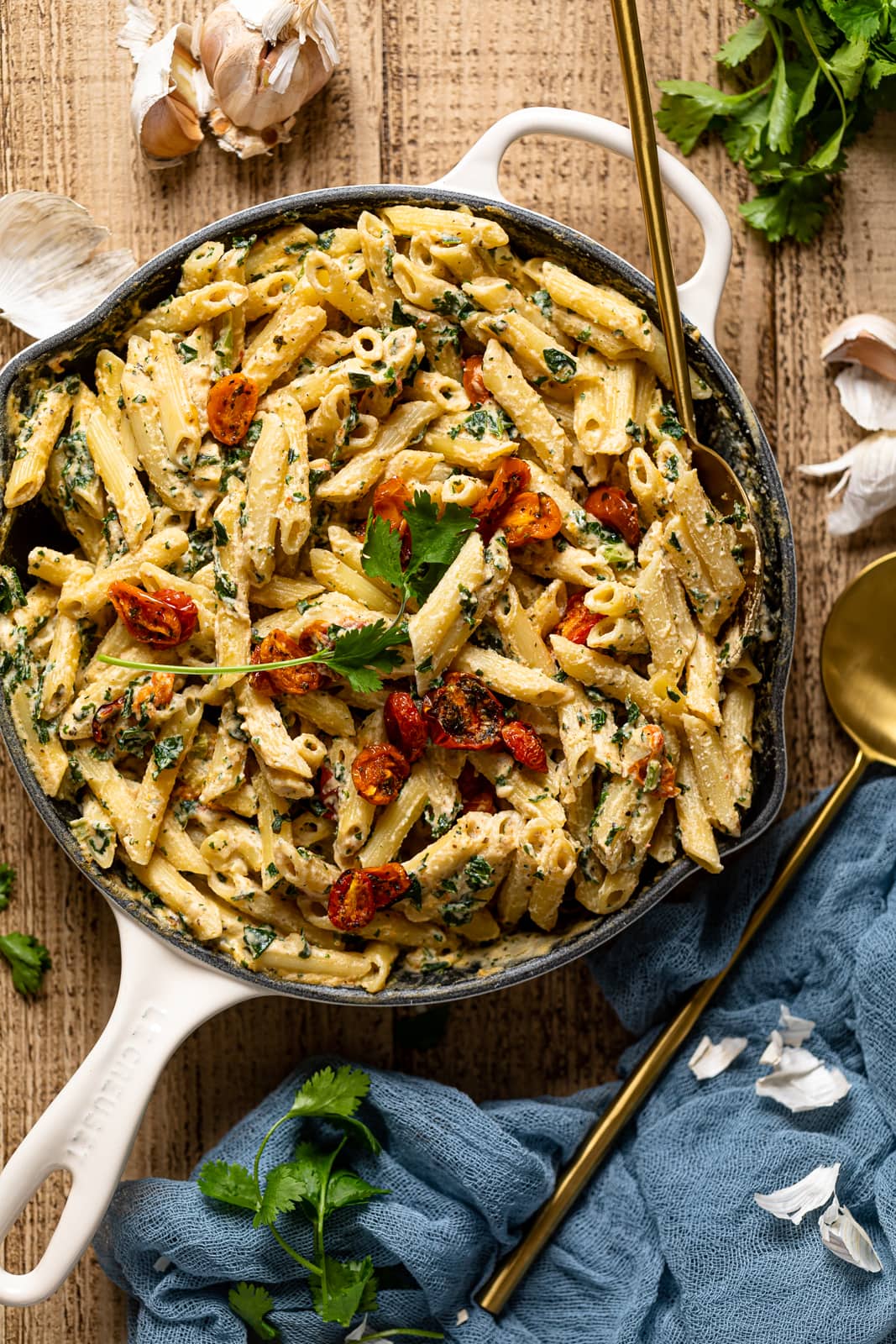 Overhead shot of a skillet of Creamy Vegan Tuscan Kale Pasta