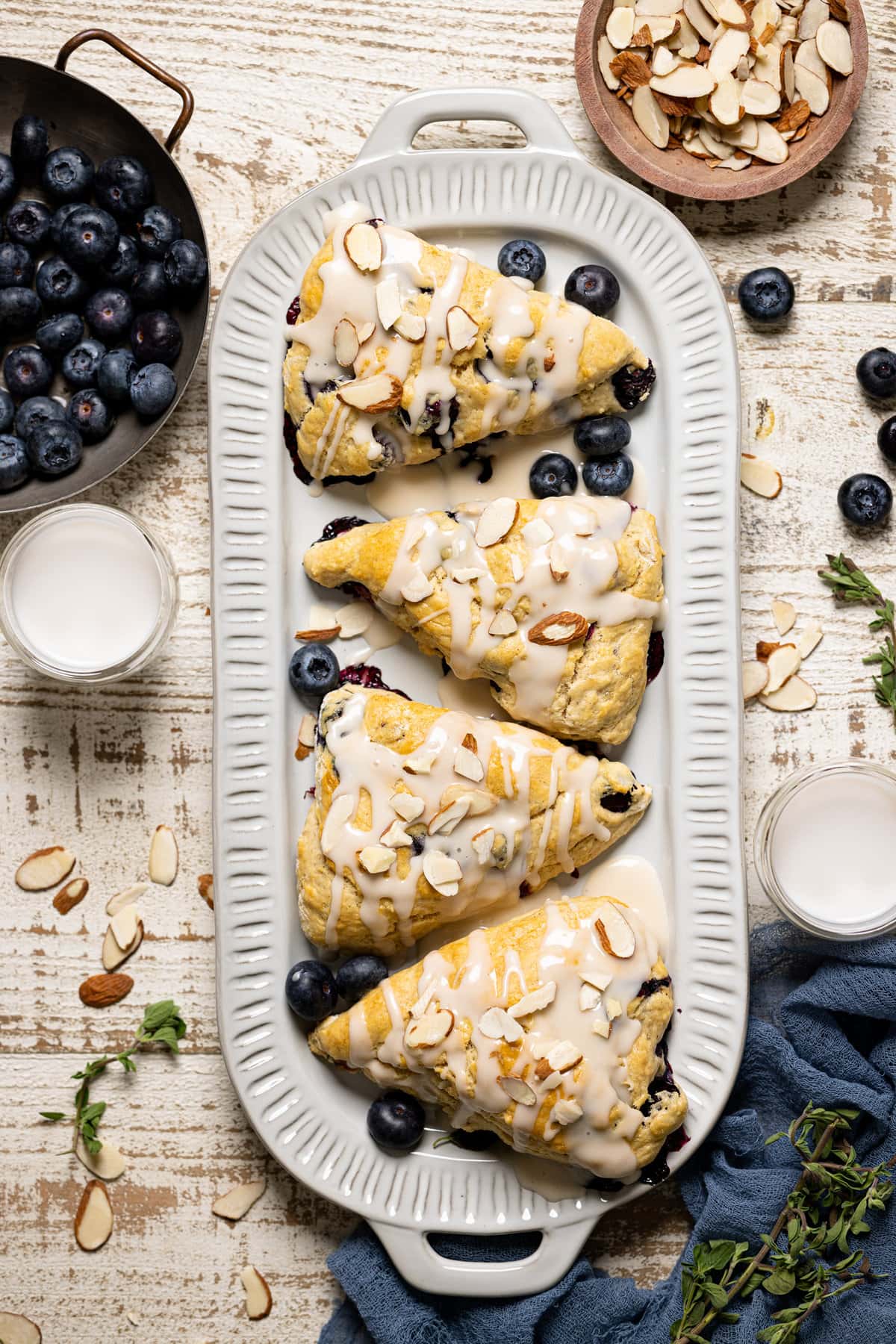 Dairy-Free Blueberry Almond Scones on an oblong plate.