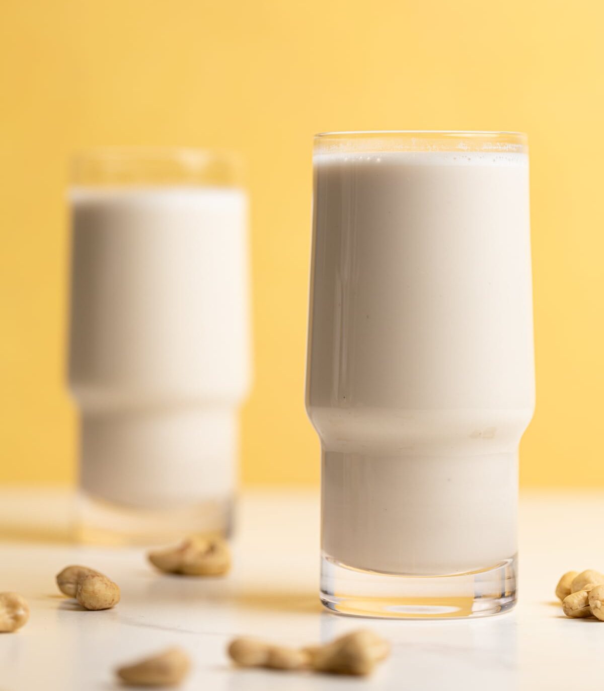 Two glasses of Homemade Creamy Cashew Milk