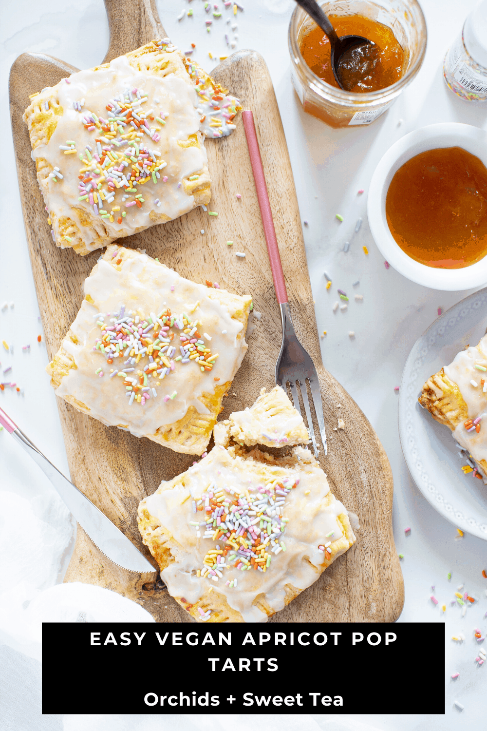 Vegan Apricot Pop Tarts lined up on a wooden board.