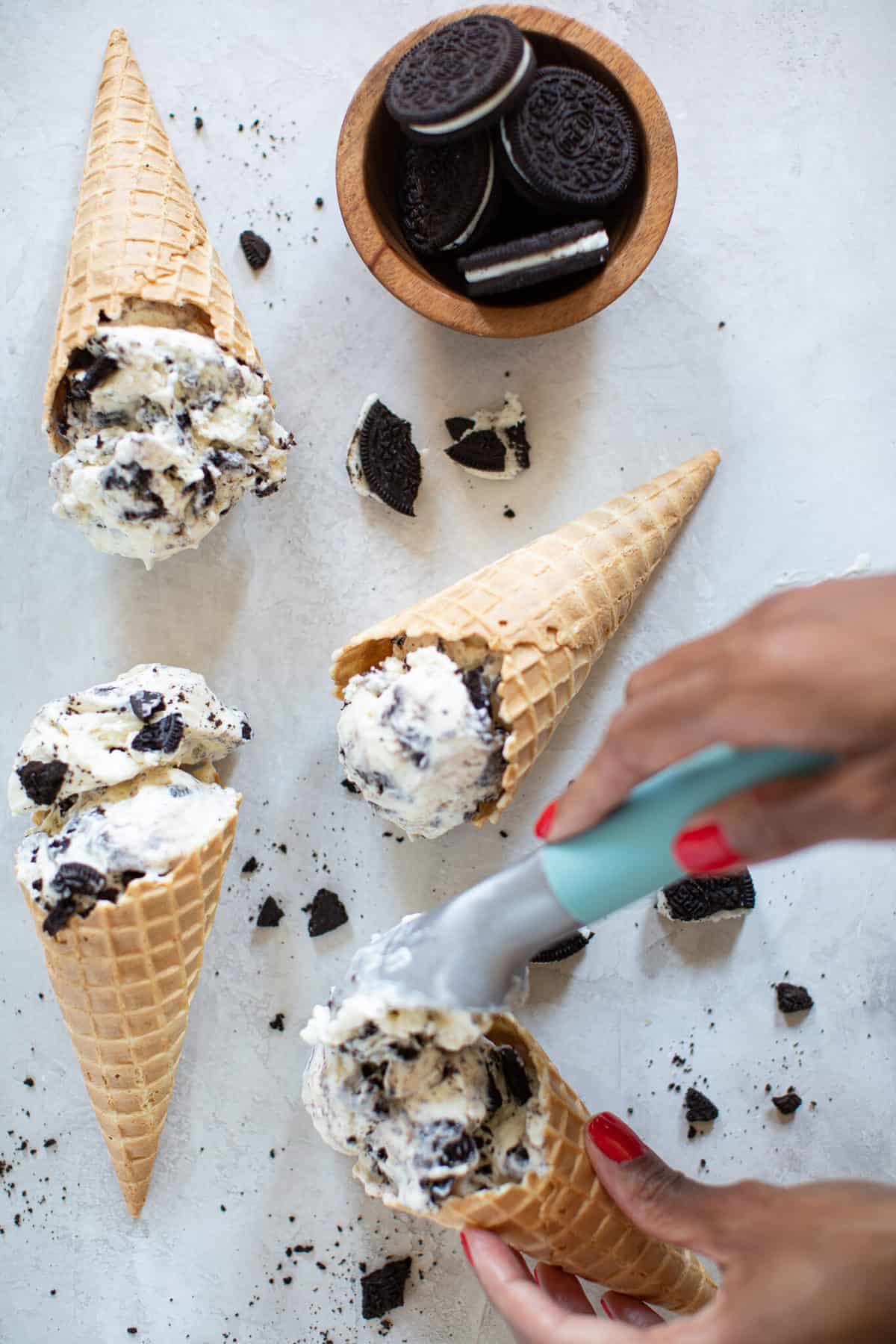 Cones of No-Churn Cookies and Cream Ice Cream lying on a table.