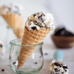 No-Churn Cookies and Cream Ice Cream in a cone standing in a glass.
