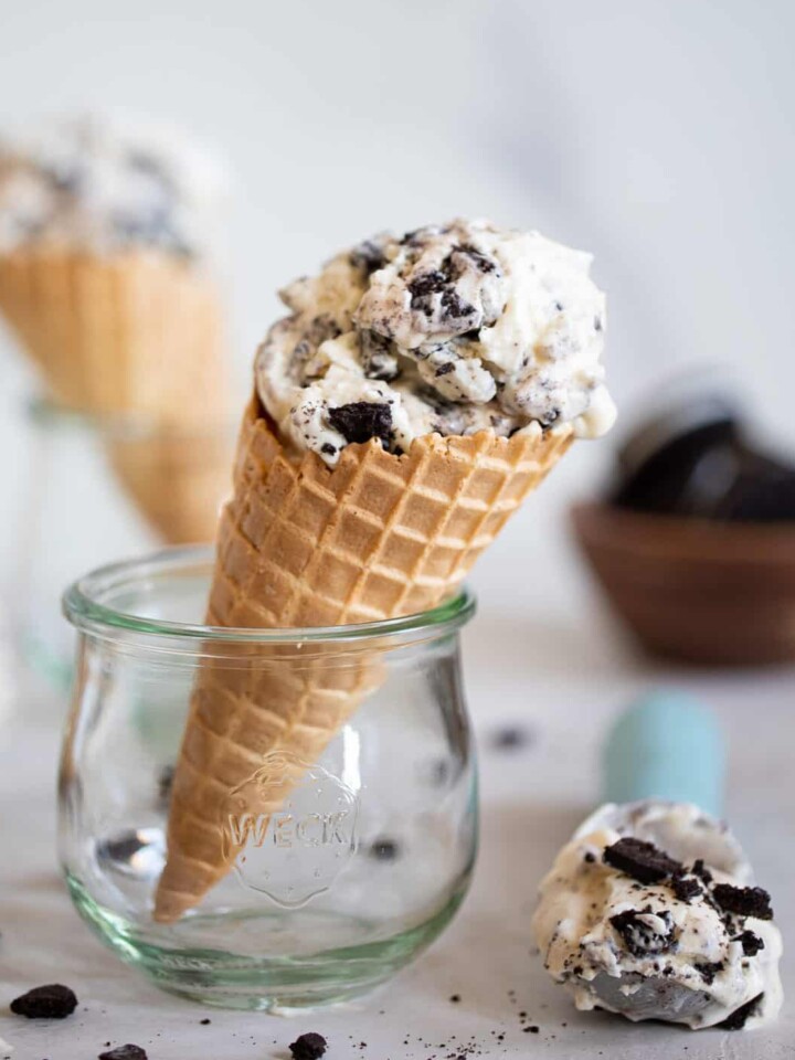 No-Churn Cookies and Cream Ice Cream in a cone standing in a glass.