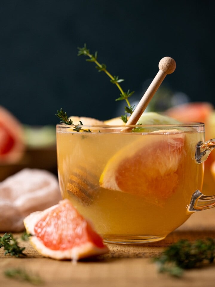 Closeup of a glass of Honey Grapefruit Cucumber Thyme Tea