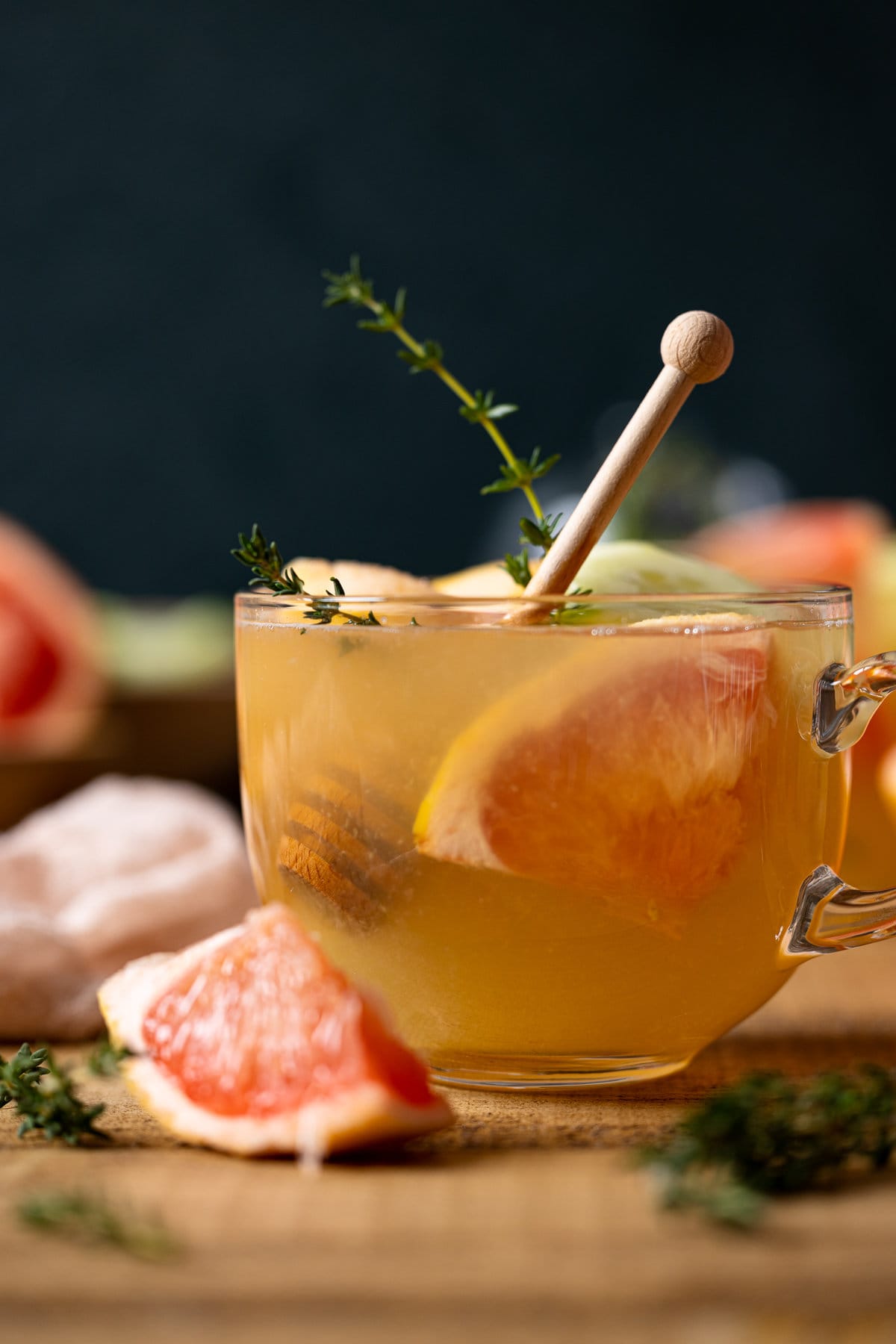 Closeup of a glass of Honey Grapefruit Cucumber Thyme Tea