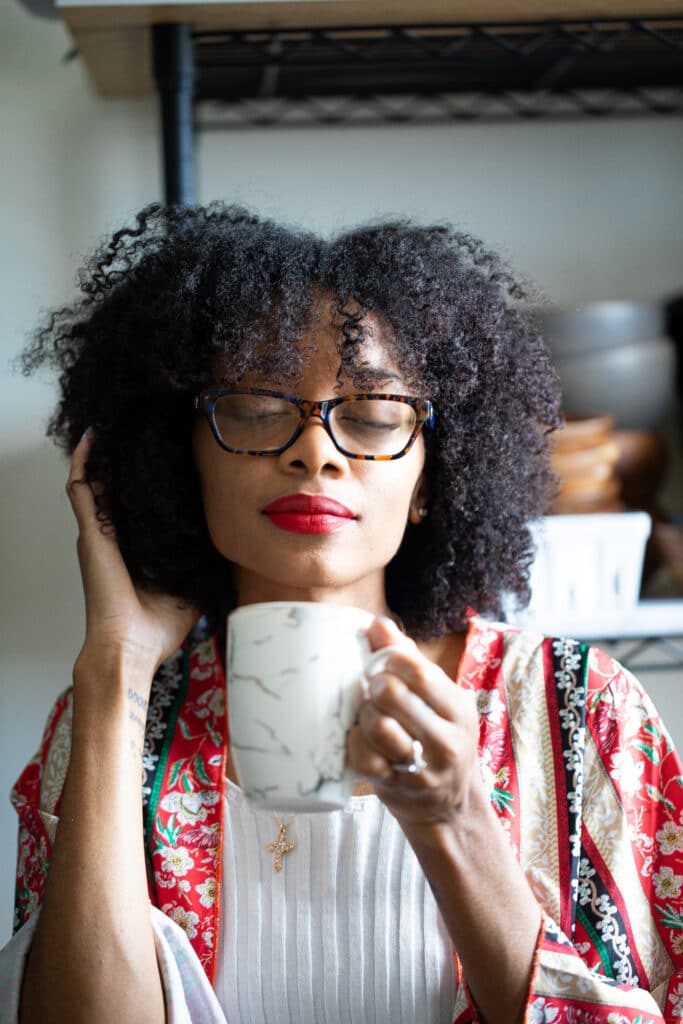 Shanika with a mug.