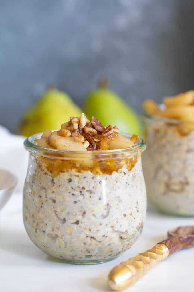 Vanilla Overnight Oats and Maple Spiced Pears in a small glass.