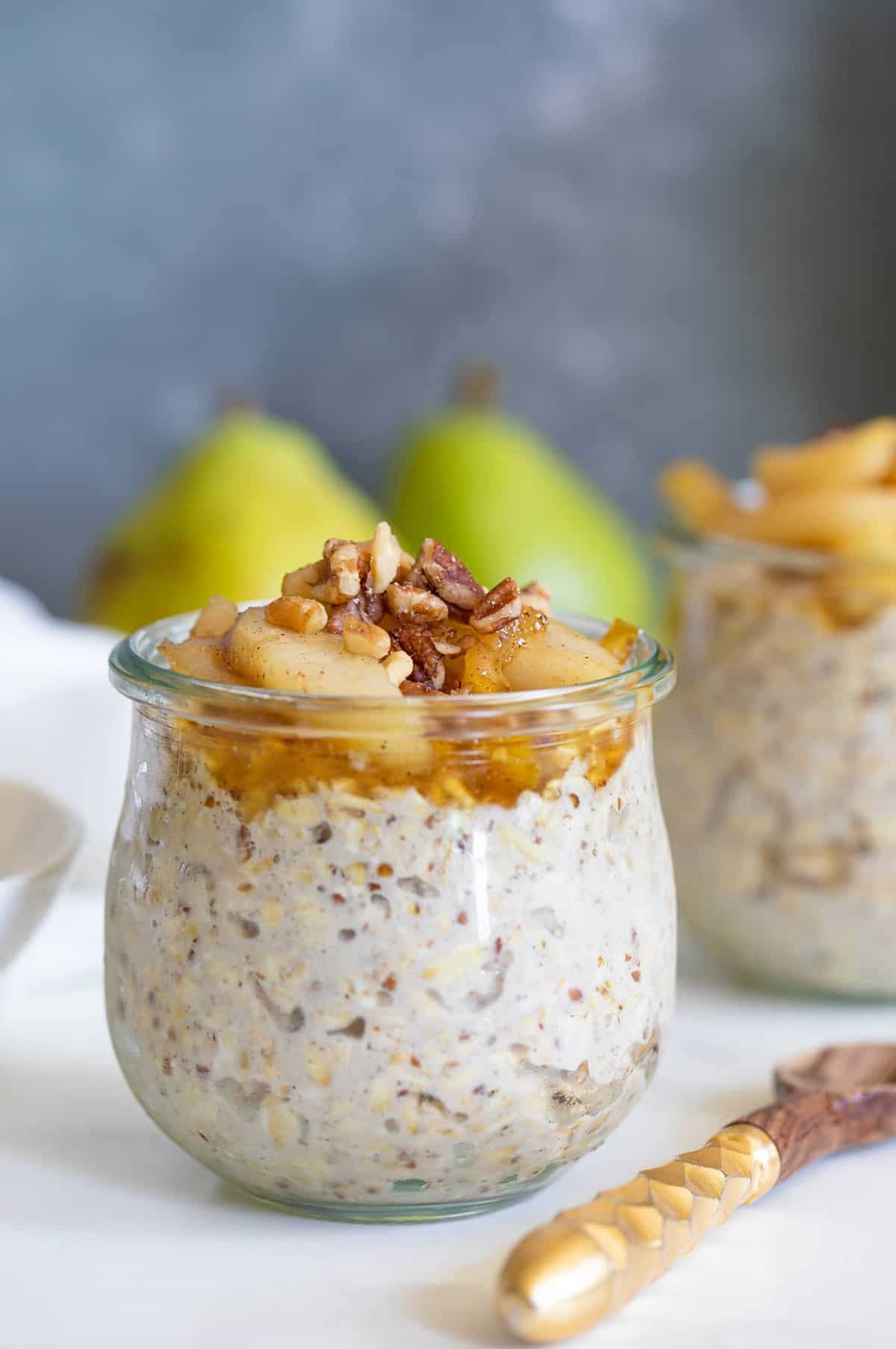 Closeup of a glass of Vanilla Overnight Oats with Maple Spiced Pears