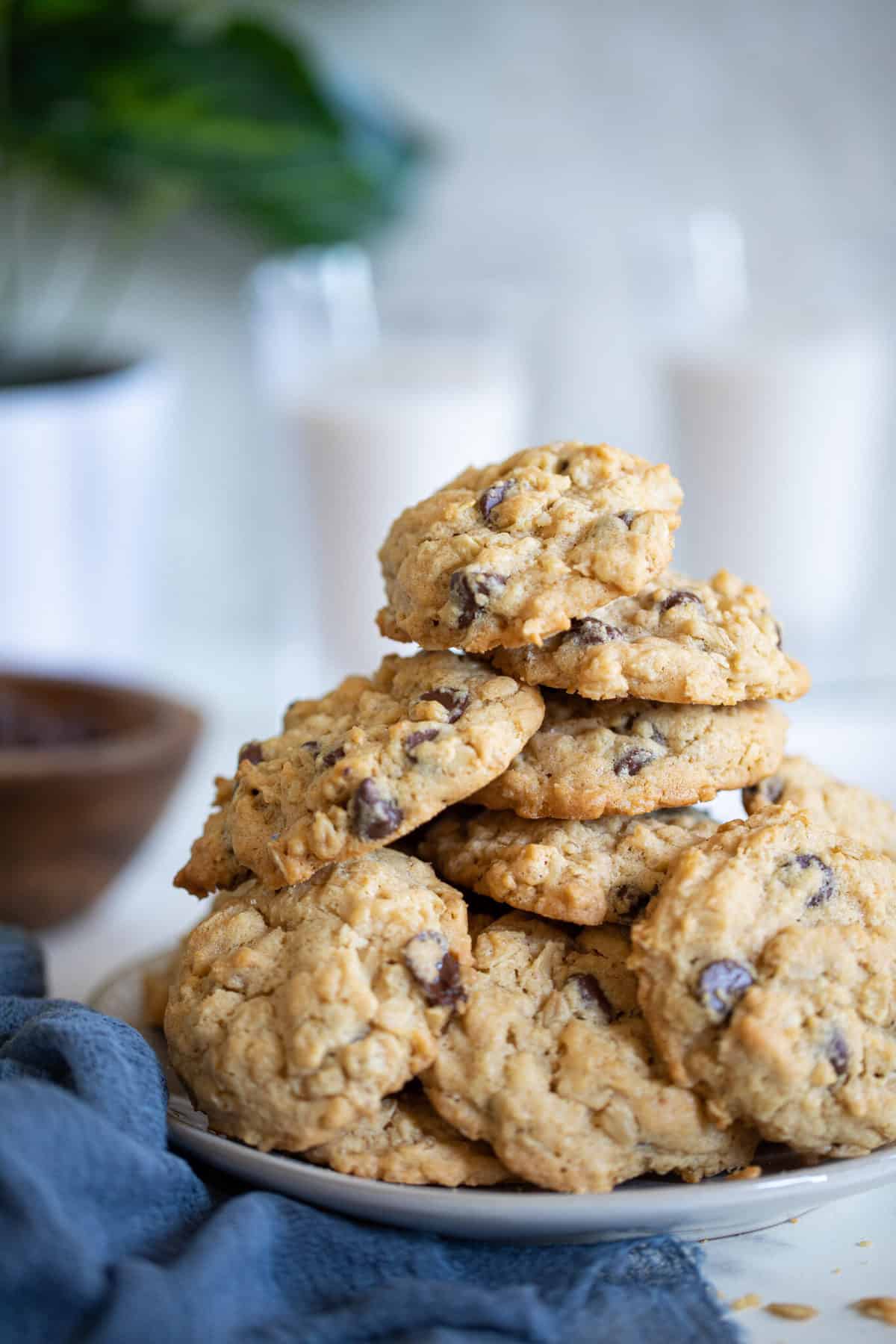 Peanut Butter Oatmeal Chocolate Chip Cookies piled on a plate.