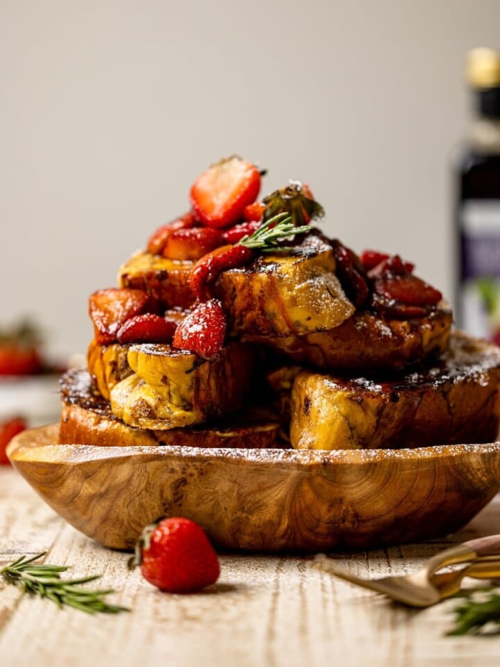 Plate piled with Balsamic Strawberry Brioche French Toast