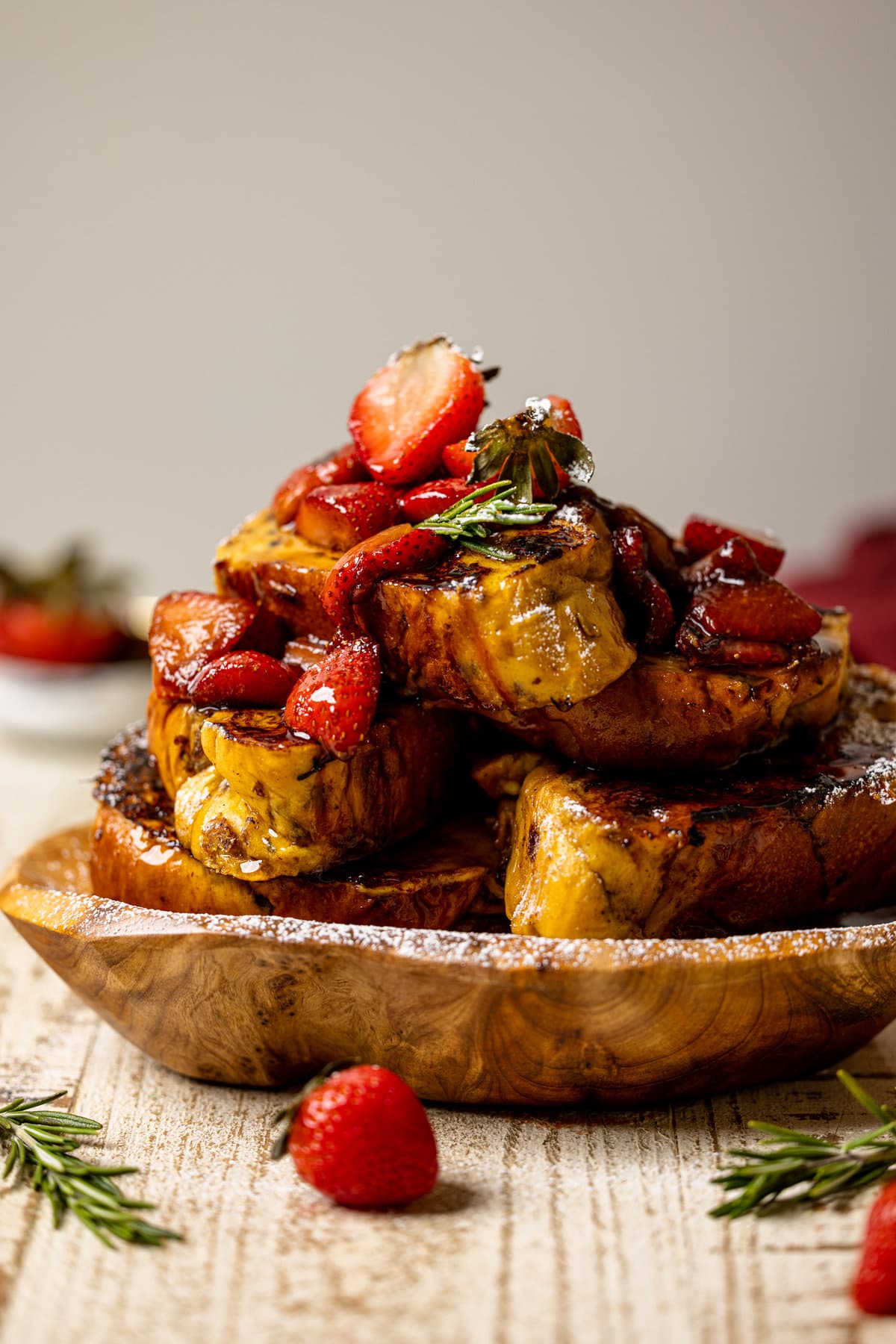 Plate piled with Balsamic Strawberry Brioche French Toast