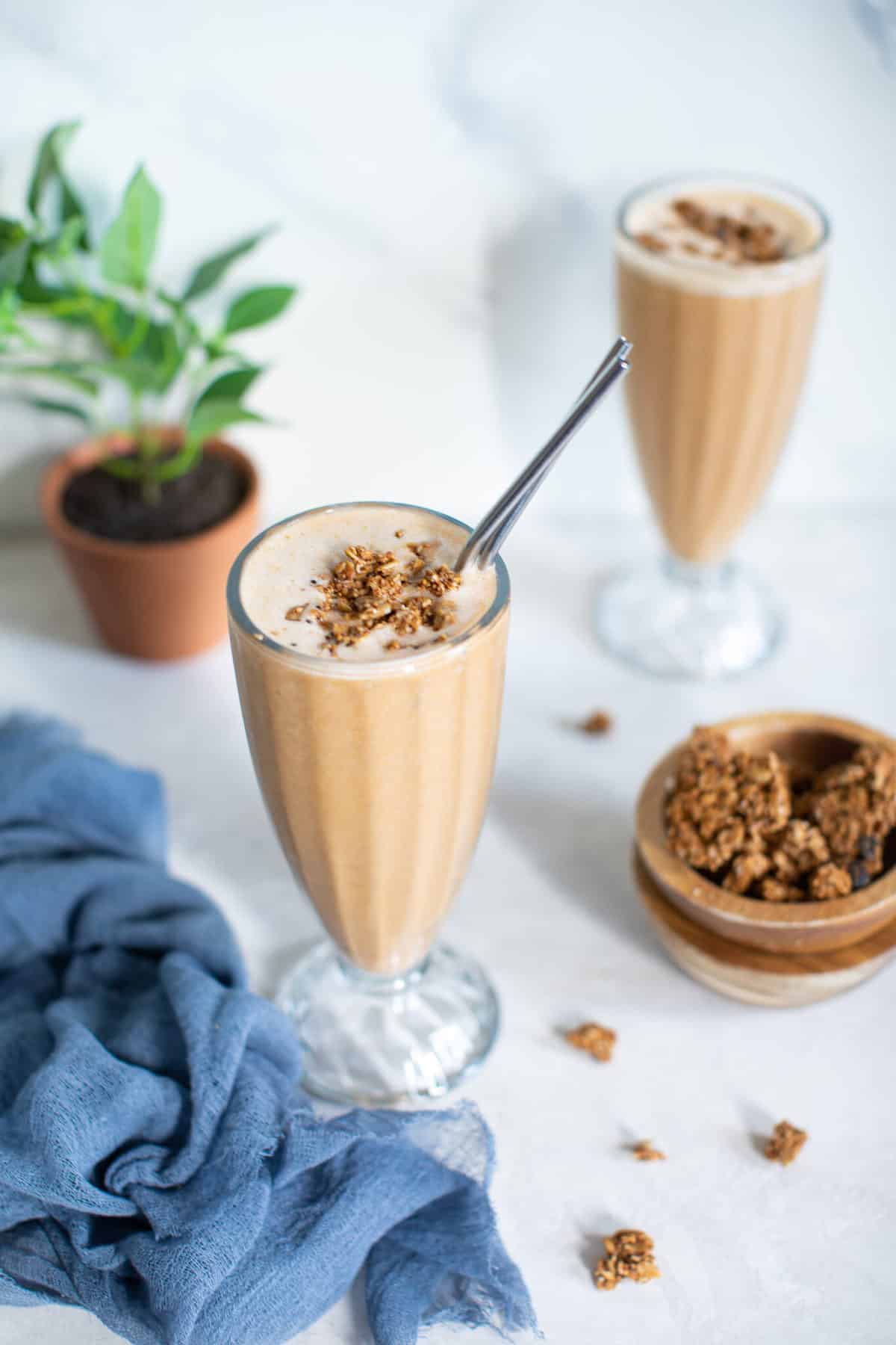 Sweet Potato Breakfast Smoothies on a white table.