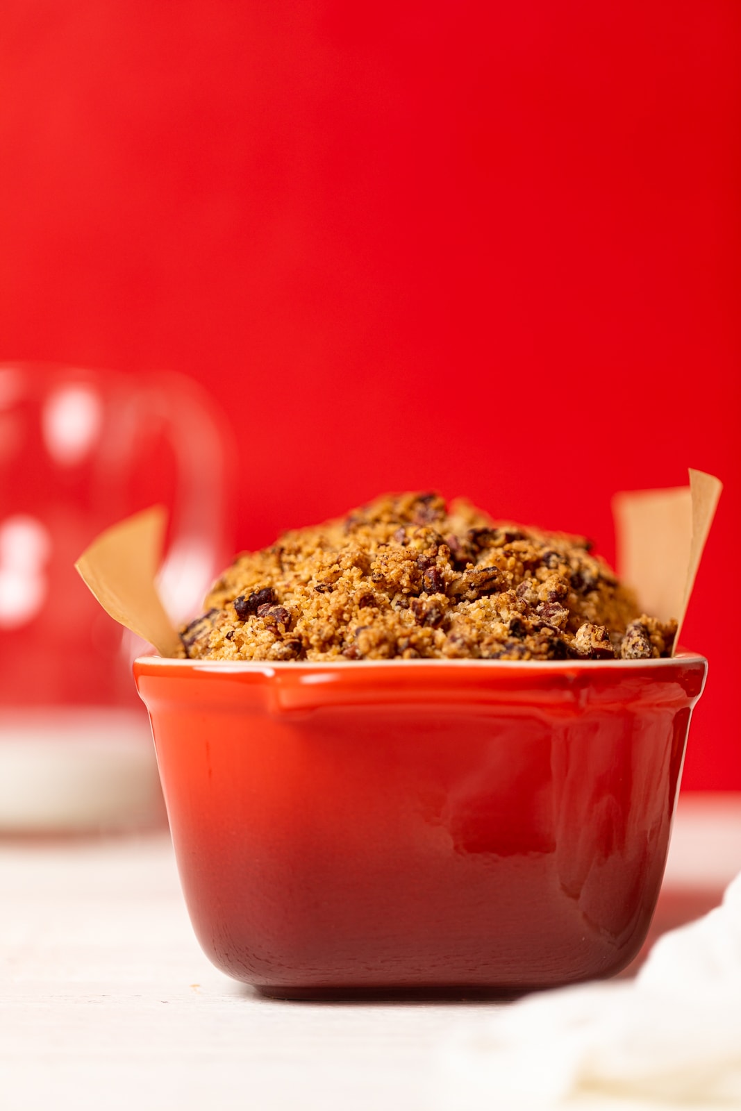 Vegan Apple Bread in a red bread pan.