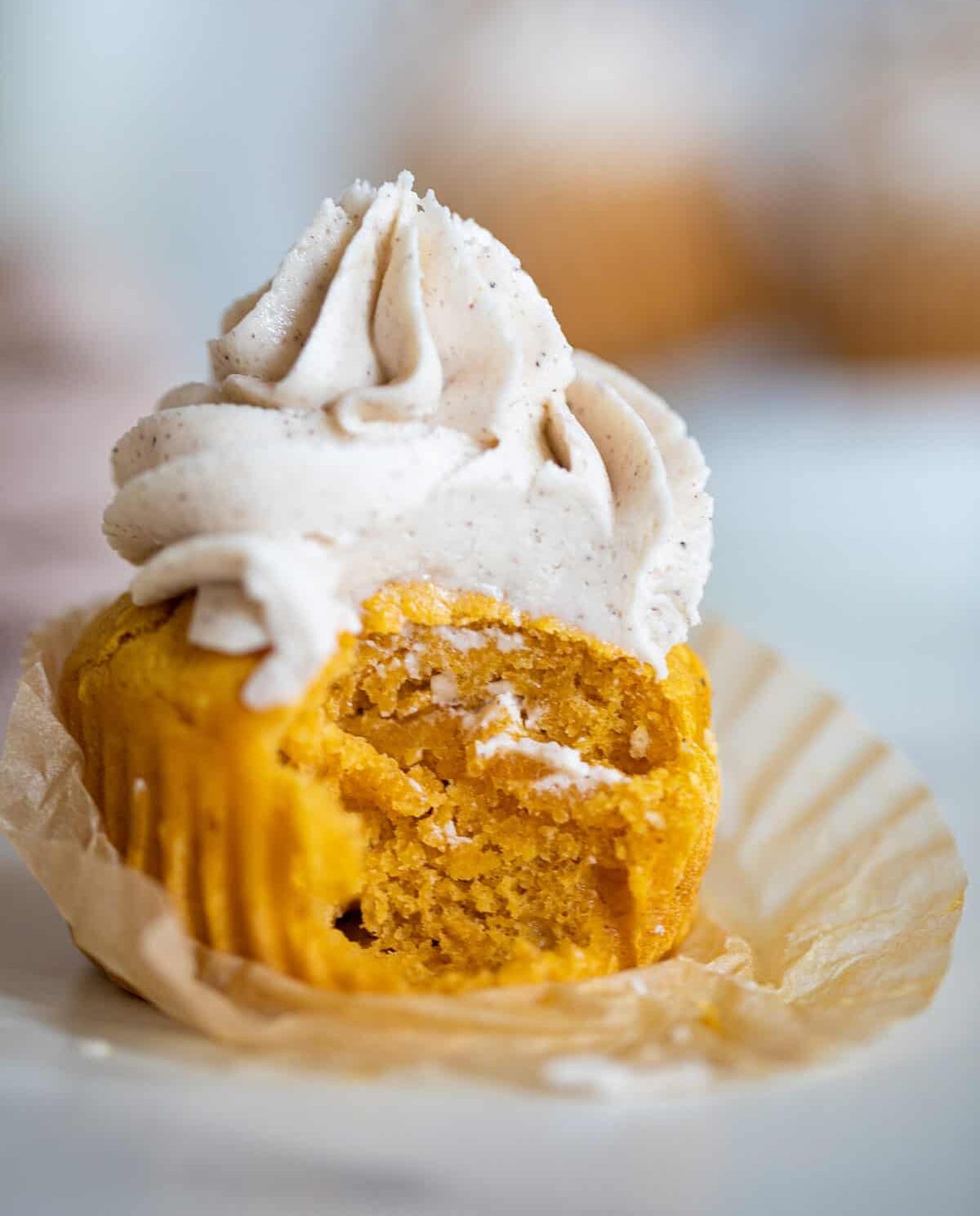 Pumpkin Chai Cupcake missing a bite.