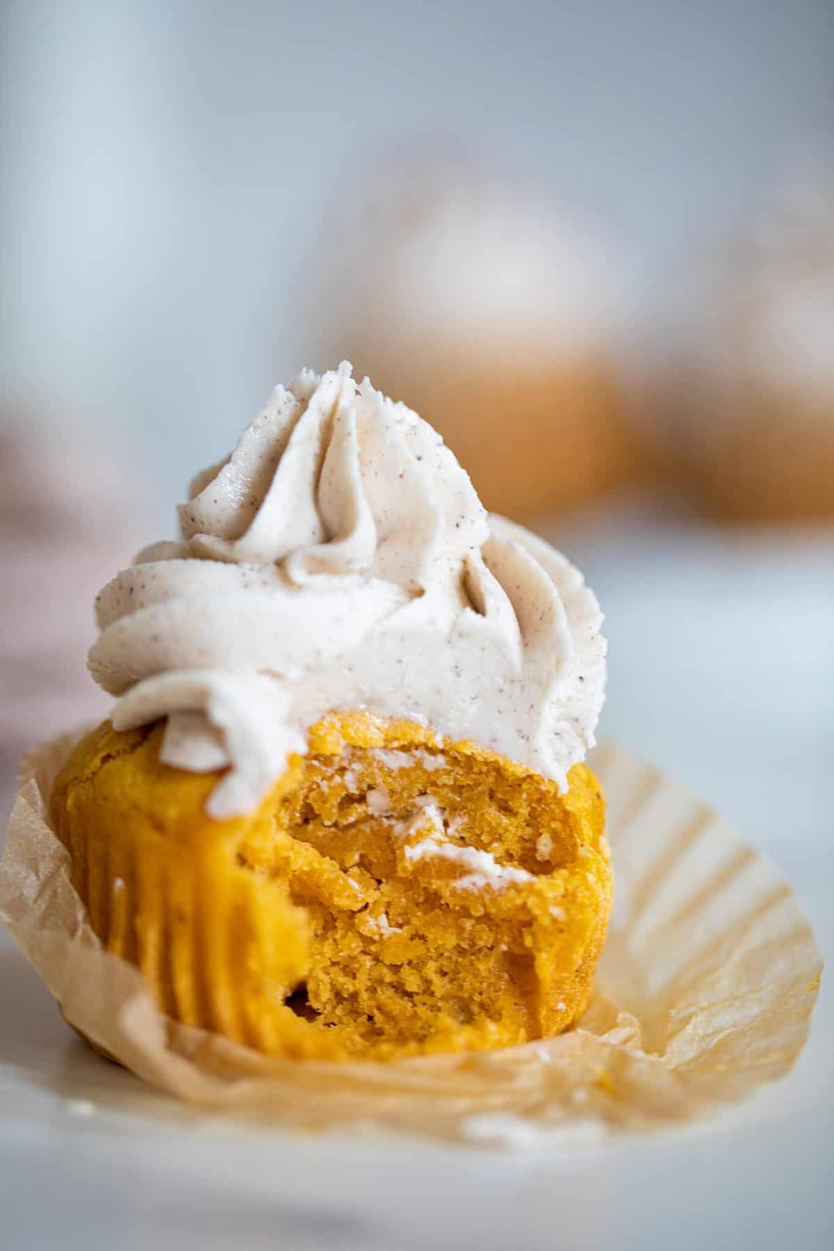 Pumpkin Chai Cupcake missing a bite.