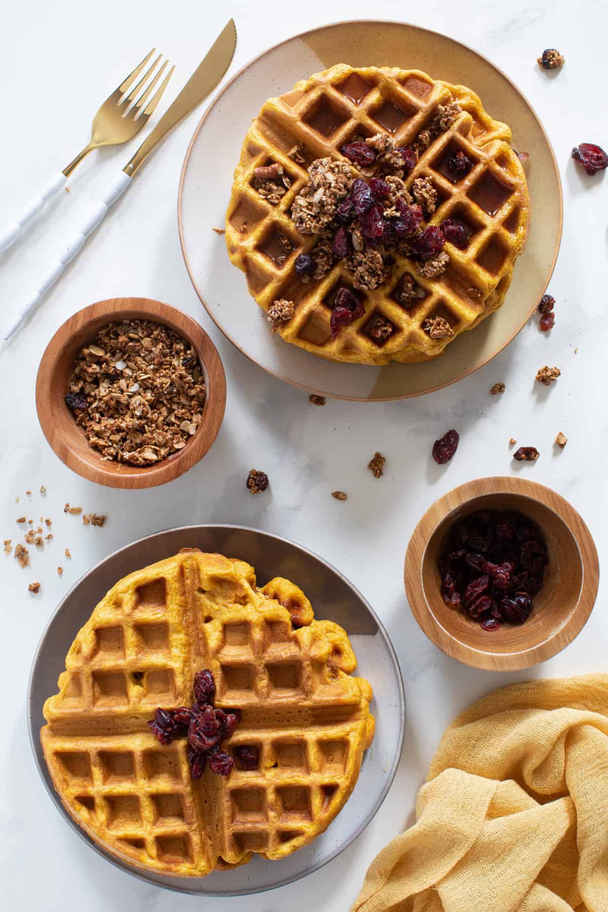 Vegan Pumpkin Spice Waffles on plates.