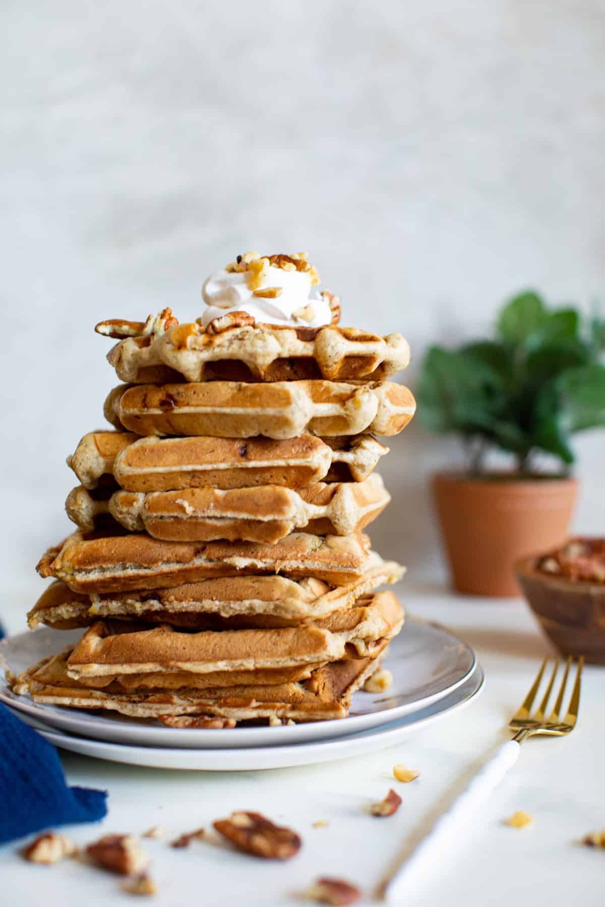 Tall stack of Maple Brown Butter Banana Waffles.