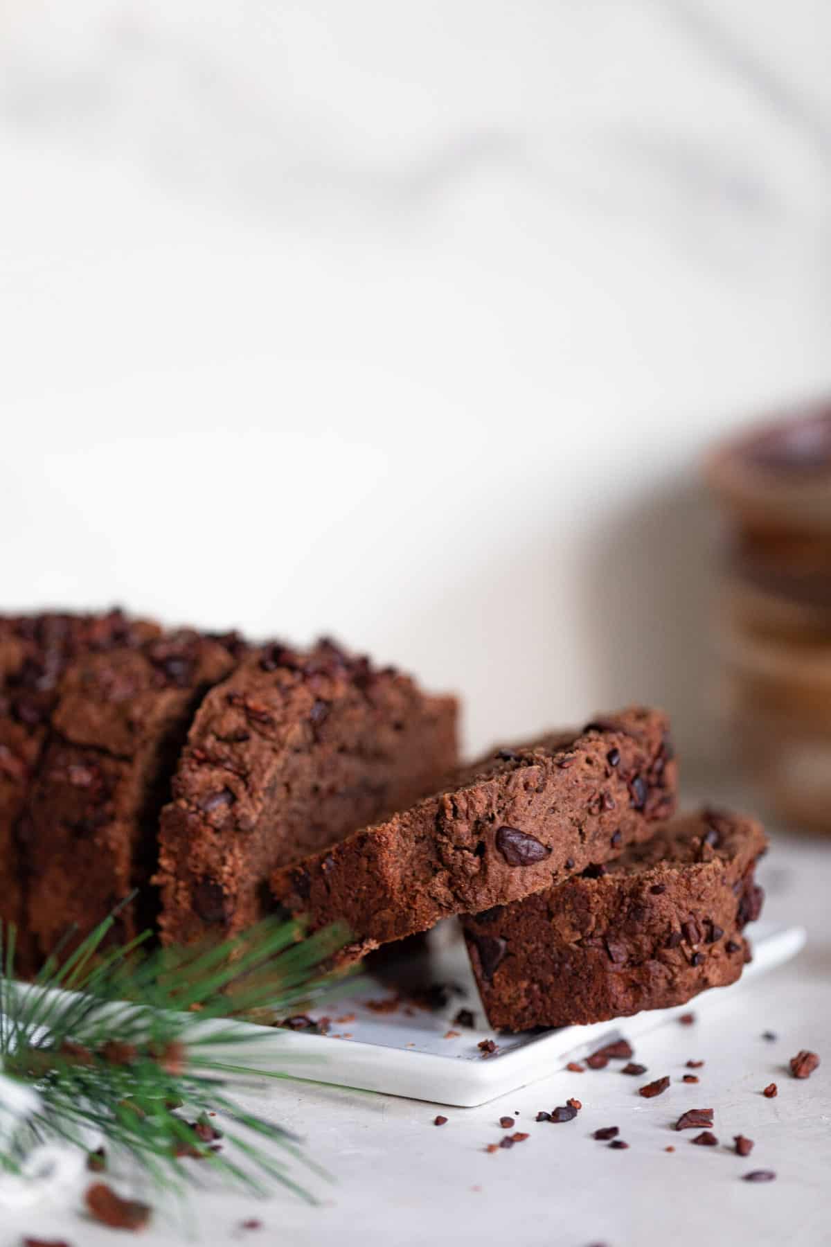 Slices of Vegan Chocolate Bread on a white plate.