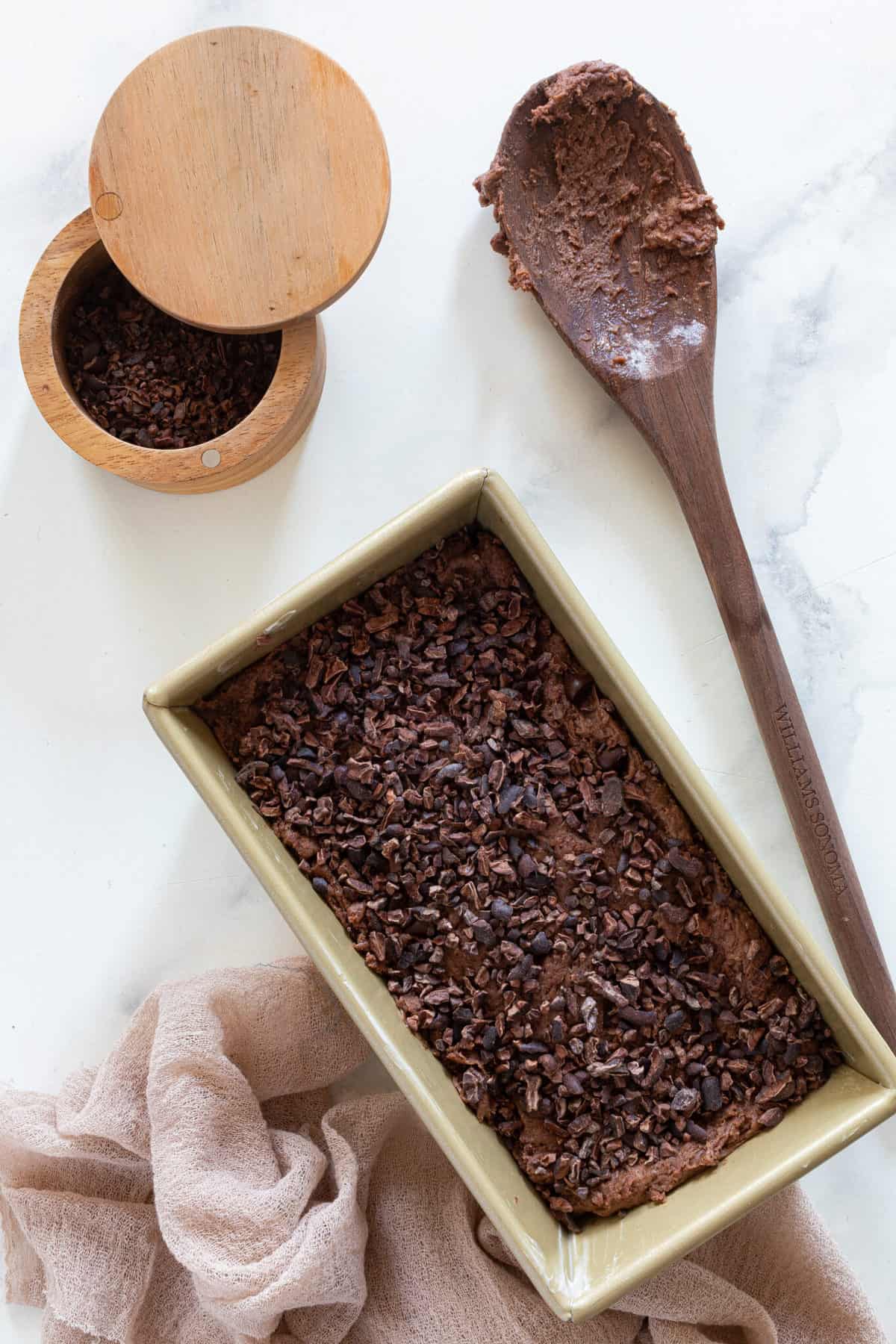 Vegan Chocolate Bread dough in a bread pan.