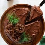 Slice being removed from a Vegan Brownie Cookie Dough Cake.