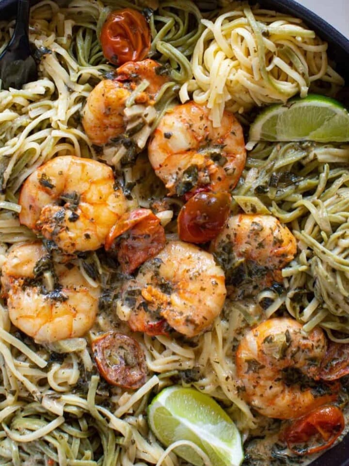 Up close shot of shrimp pasta in a skillet.