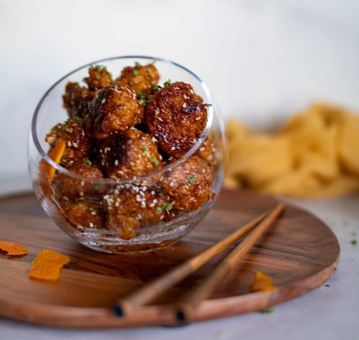 Crispy Baked Sticky Orange Cauliflower Bites in a glass bowl.