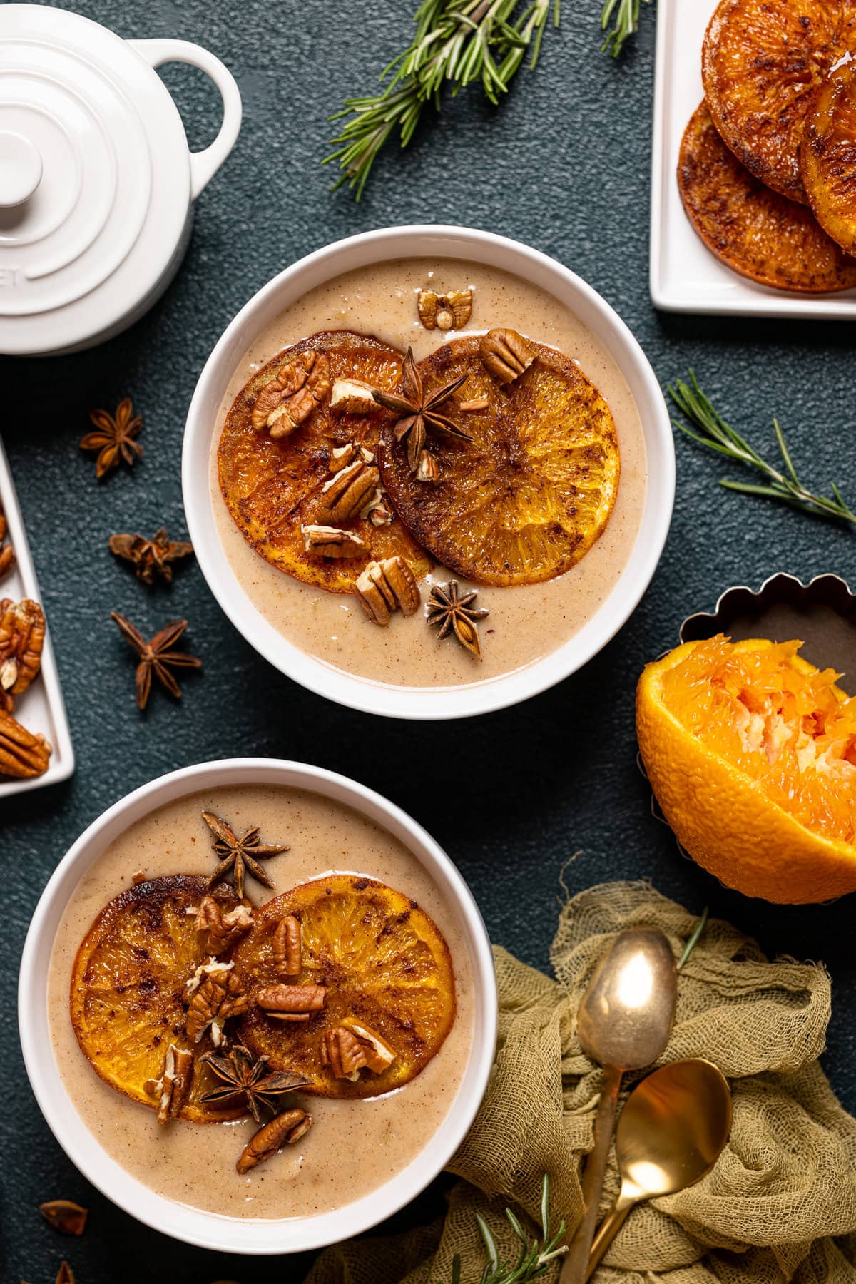 Two bowls of Maple Cinnamon Oatmeal with Roasted Oranges
