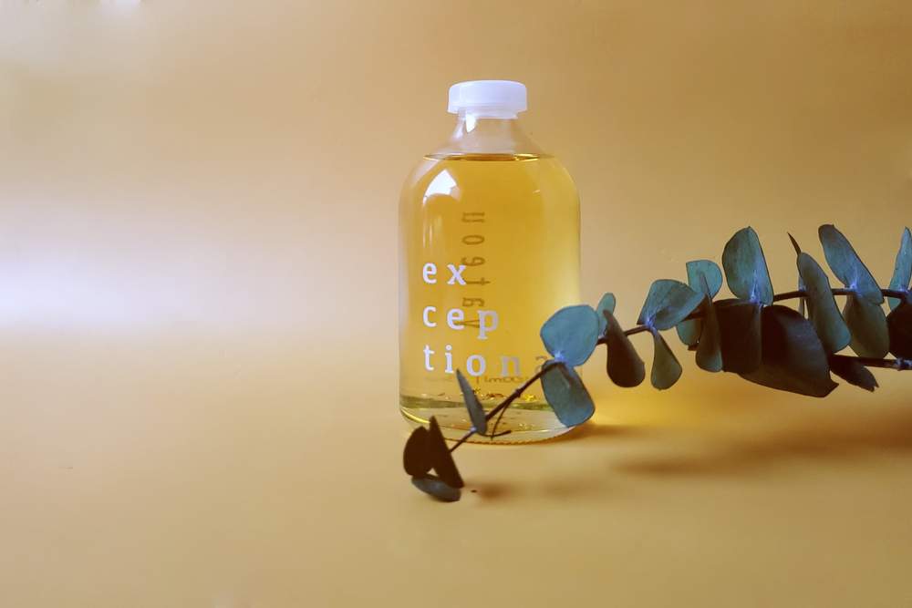 Bottle of yellow essential oil from Yateou