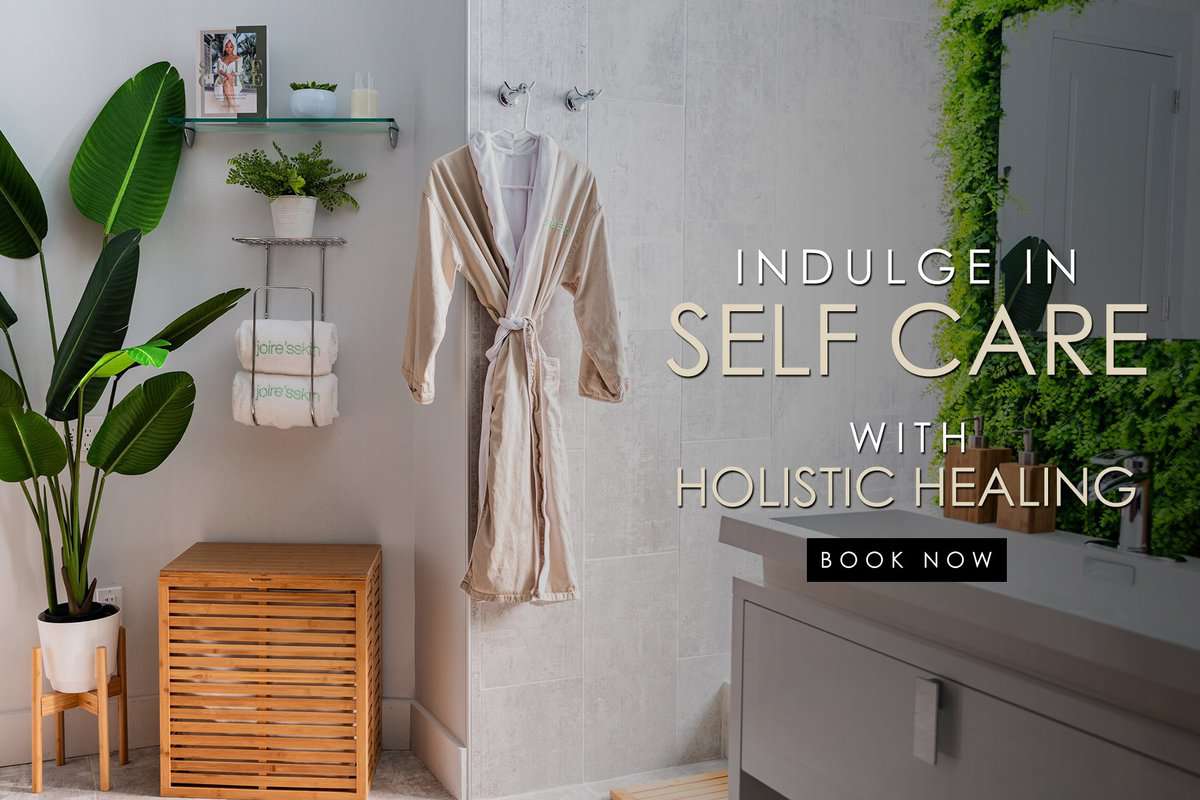 Robe hanging with text \"Indulge in Self Care with Holistic Healing.\"