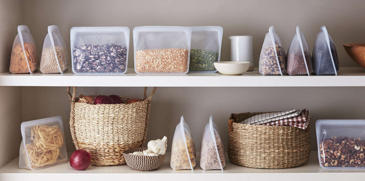 Shelves of food in Stasher storage bags.