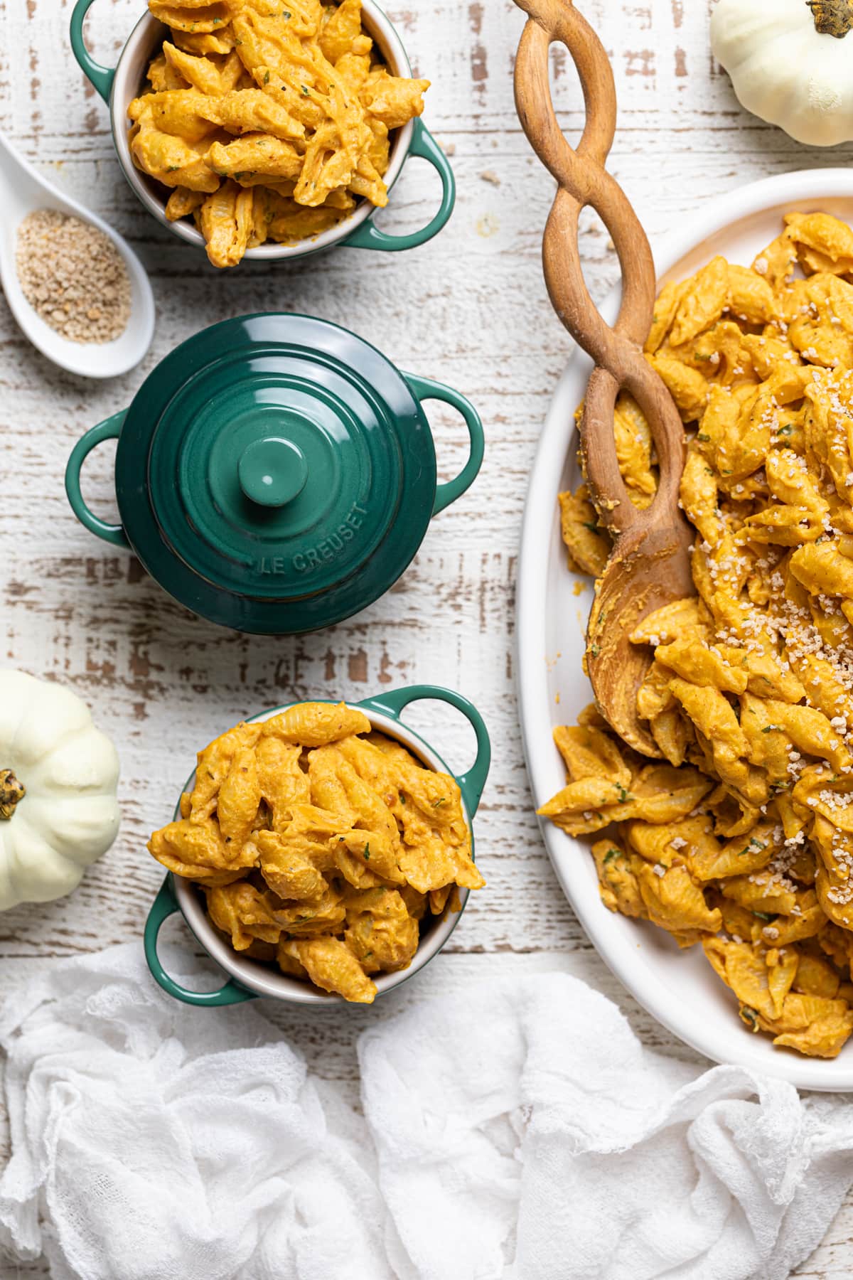 Serving platter and mini cocottes of Pumpkin Mac and Cheese