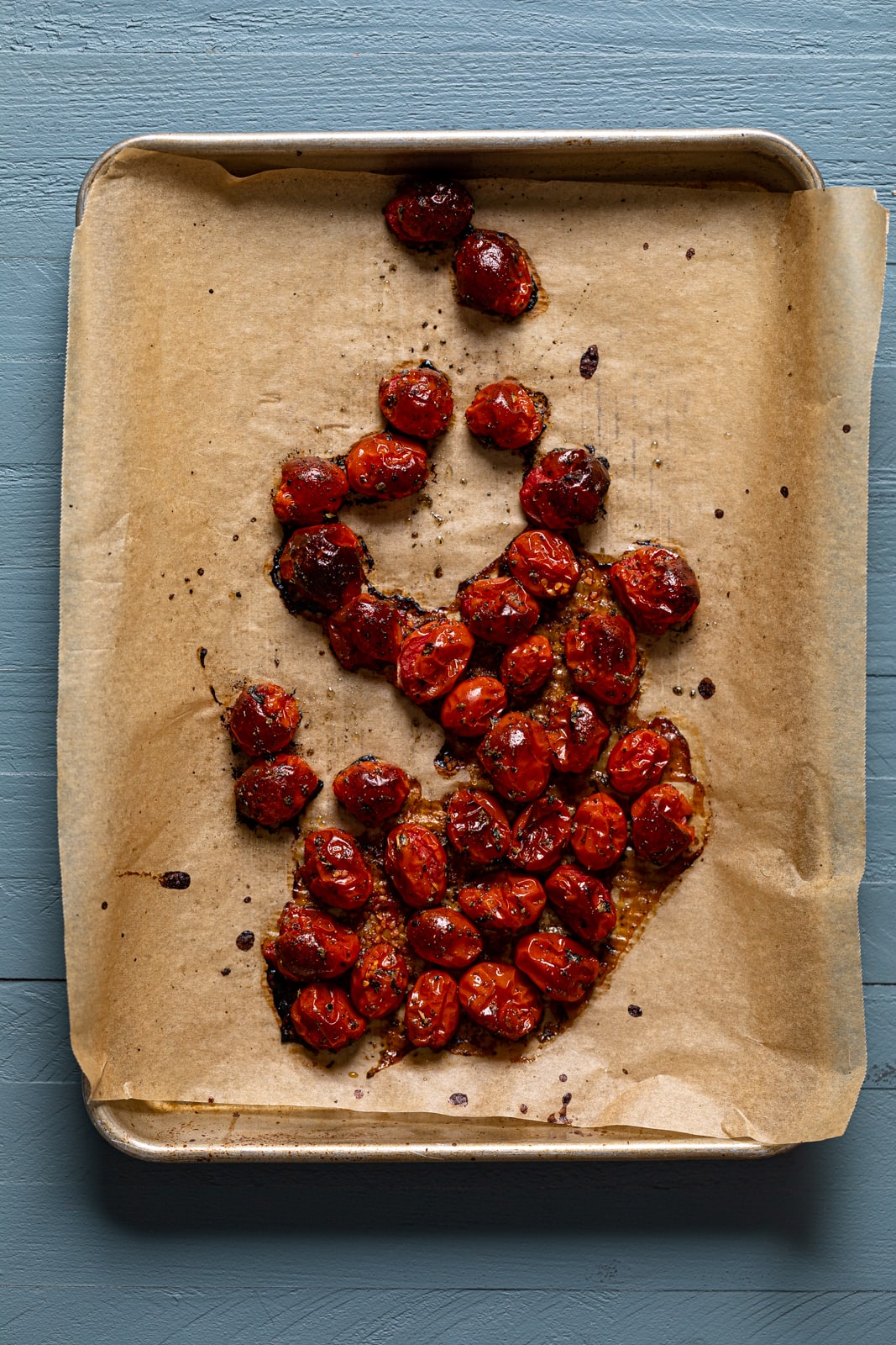 Roasted tomatoes on parchment paper