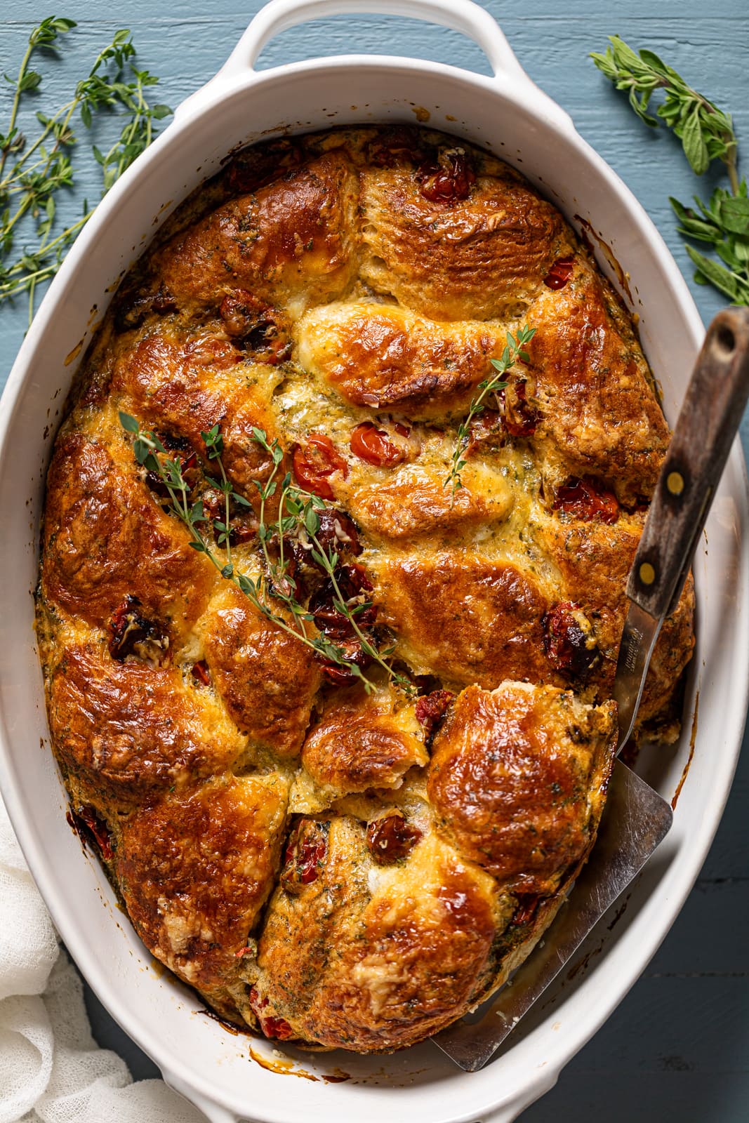 Overhead shot of a baking pan of Southern Caprese Biscuit Breakfast Strata