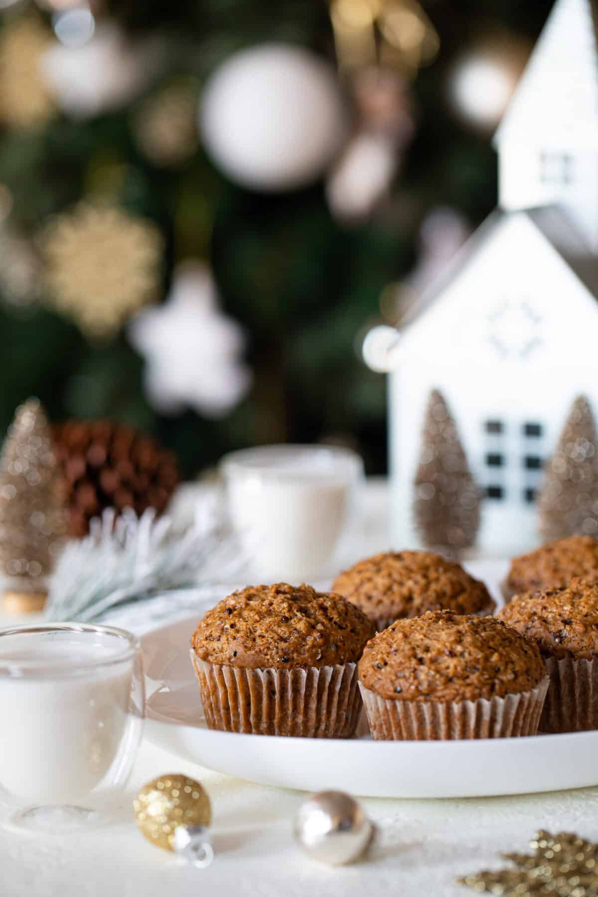 Plate of Vegan Gingerbread Quinoa Muffins with a glass of milk.