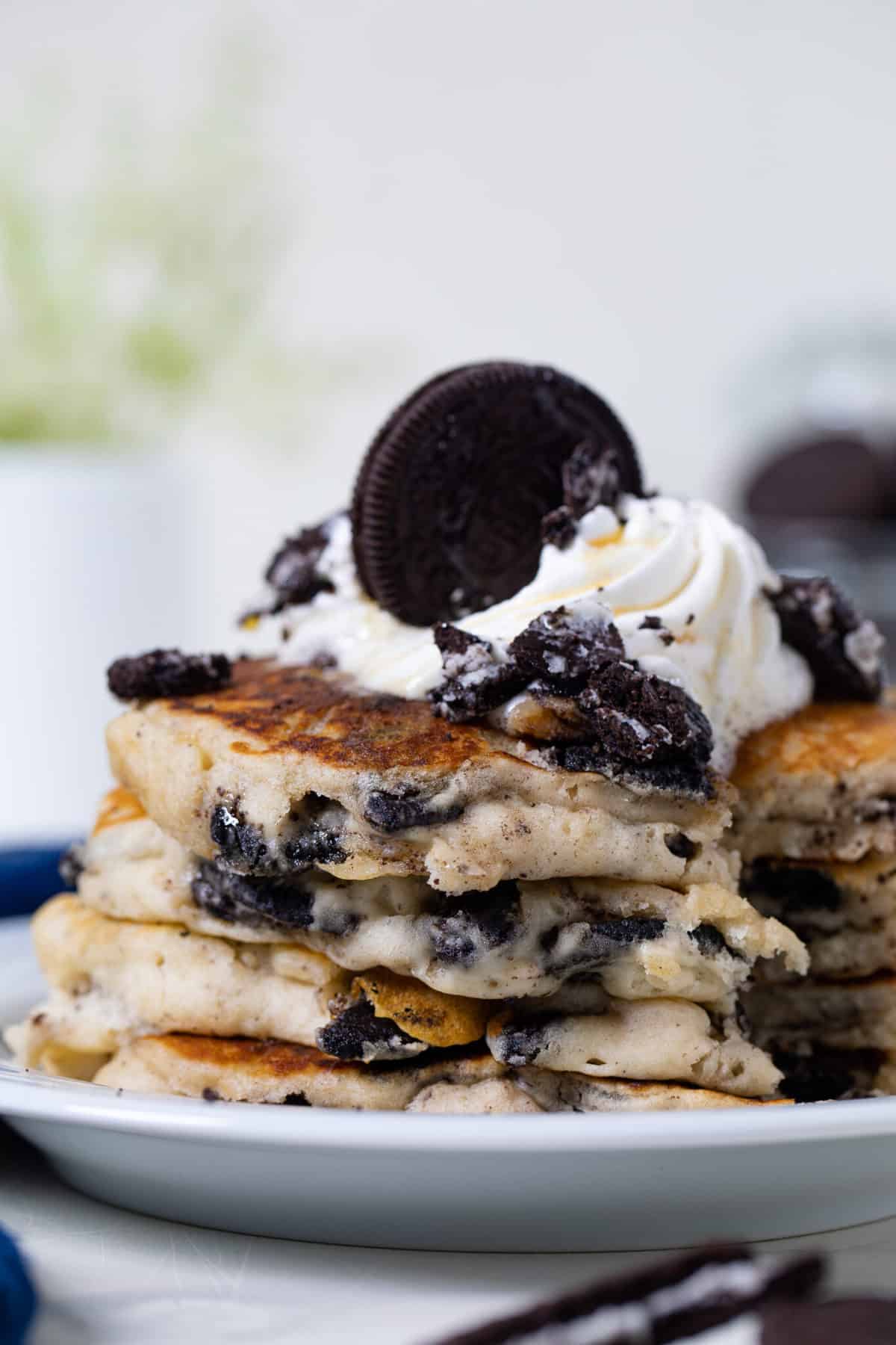 Stack of Vegan Oreo Pancakes missing a slice.