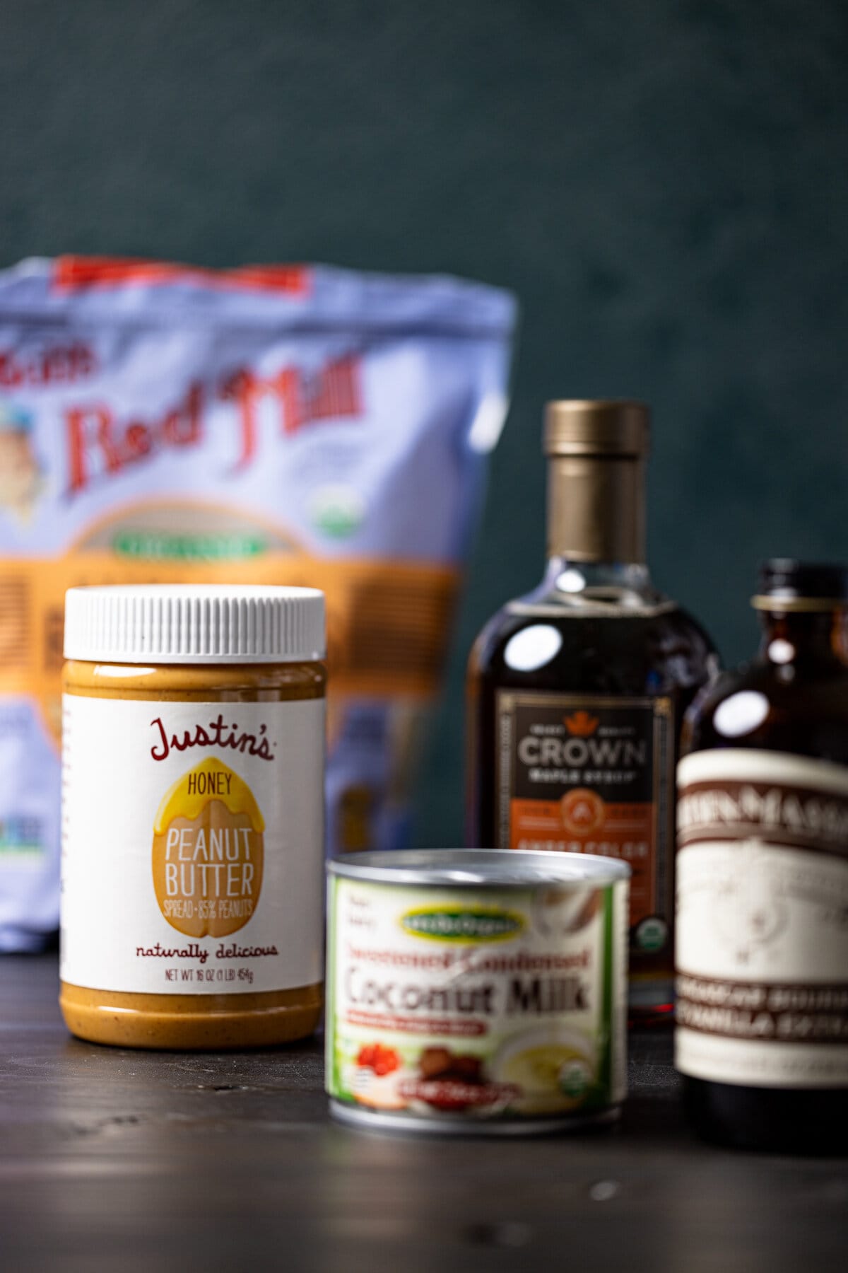 Ingredients for Jamaican Vegan Peanut Punch including honey peanut butter, coconut milk, and vanilla extract