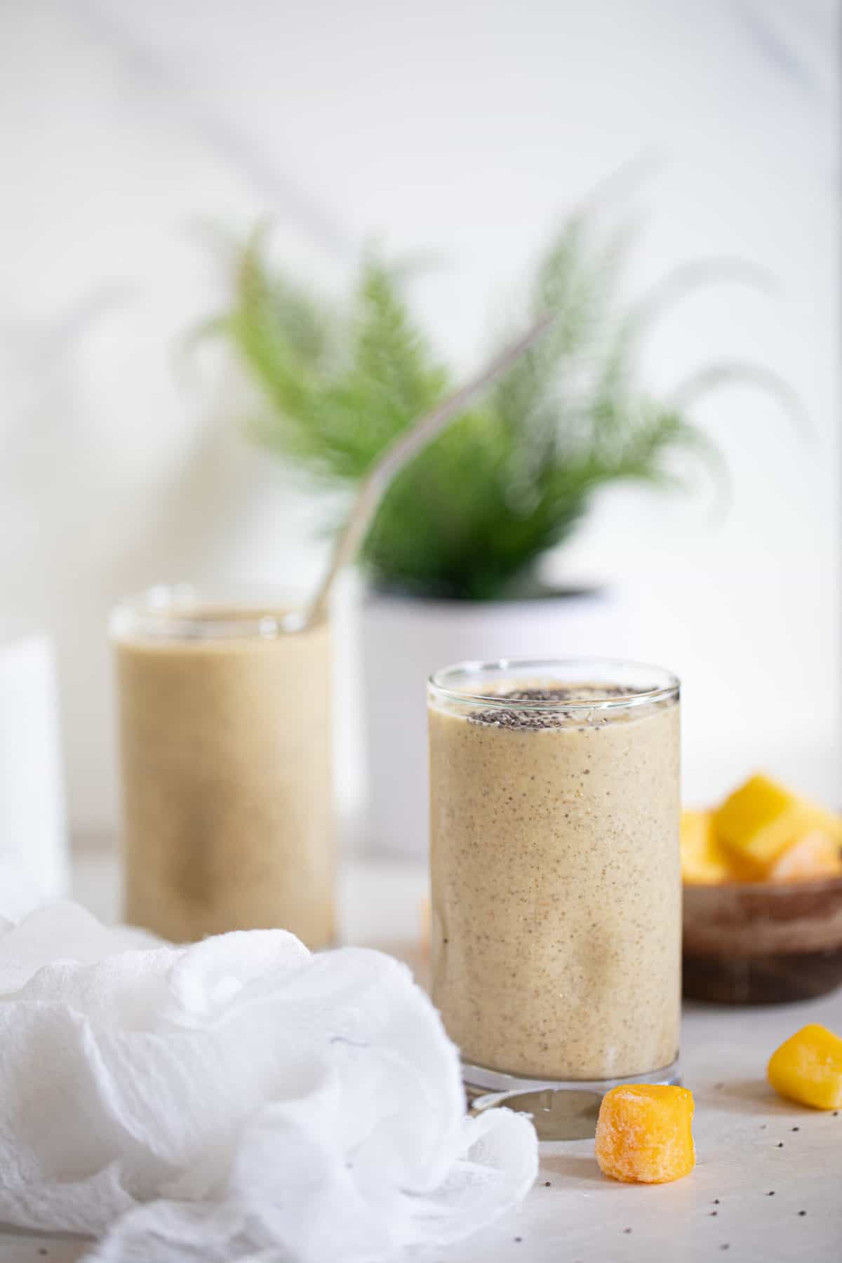 Mango Chia Seed Smoothie in two glasses.