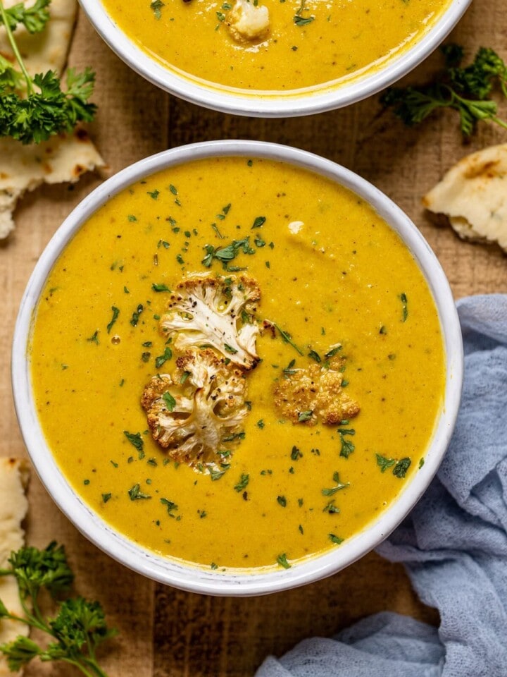 Closeup of a bowl of Creamy Roasted Garlic Cauliflower Chickpea Soup