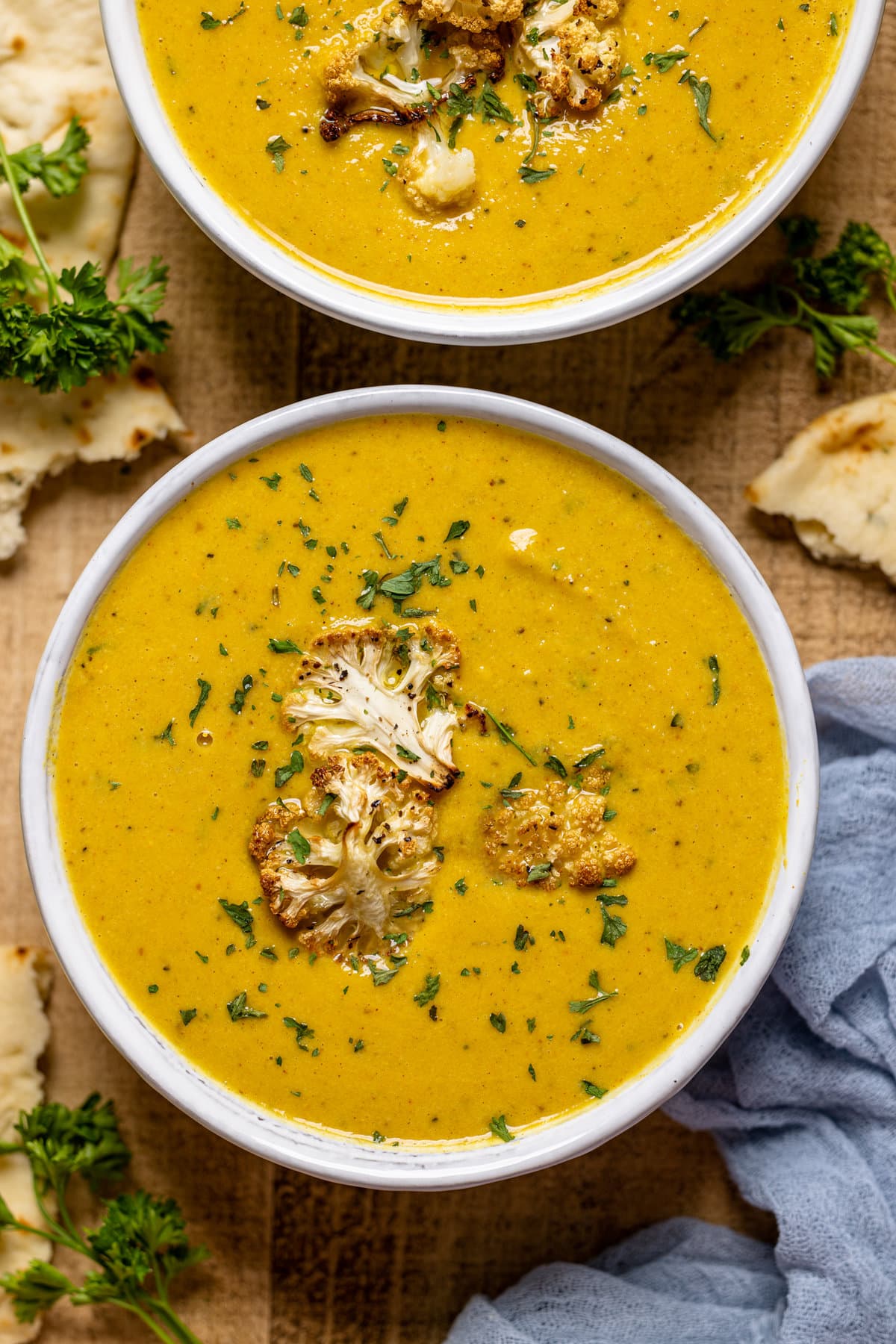 Closeup of a bowl of Creamy Roasted Garlic Cauliflower Chickpea Soup