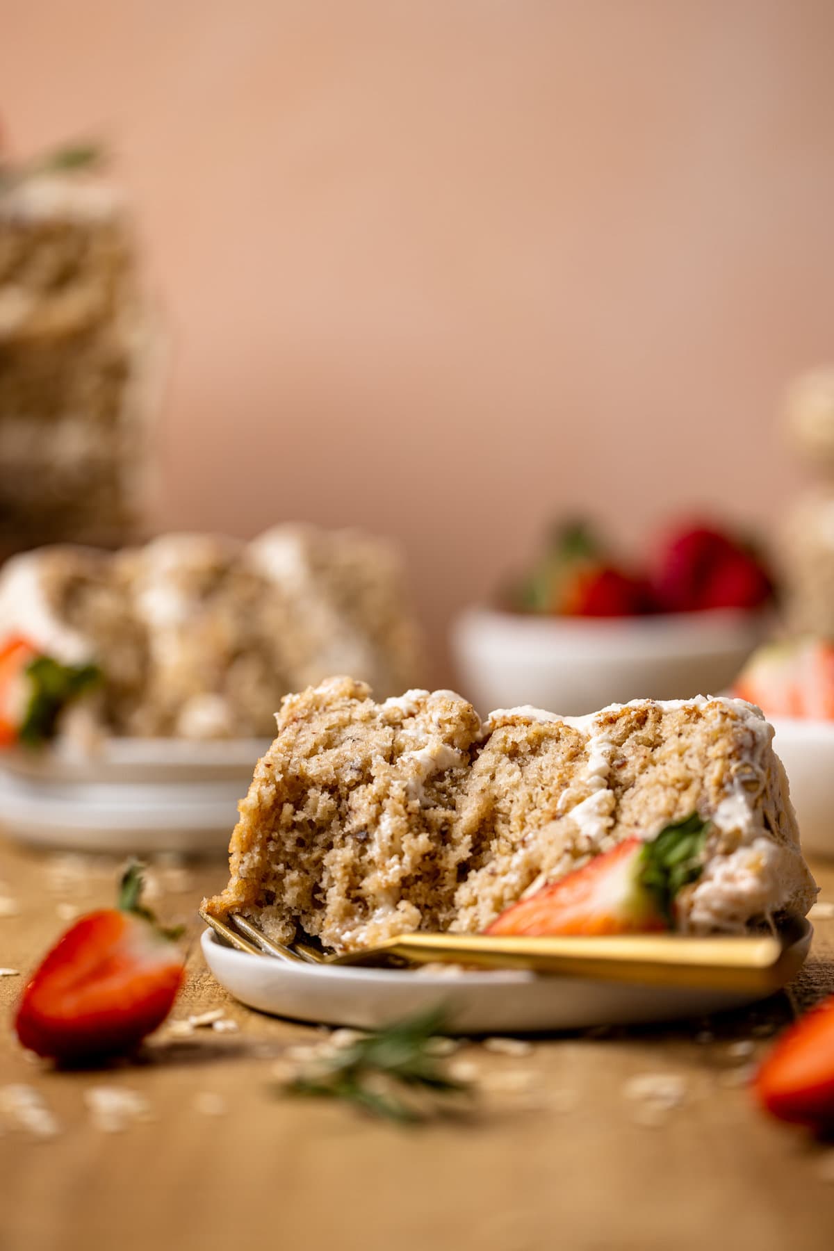 Slice of Vegan Strawberry Oatmeal Cake with a fork