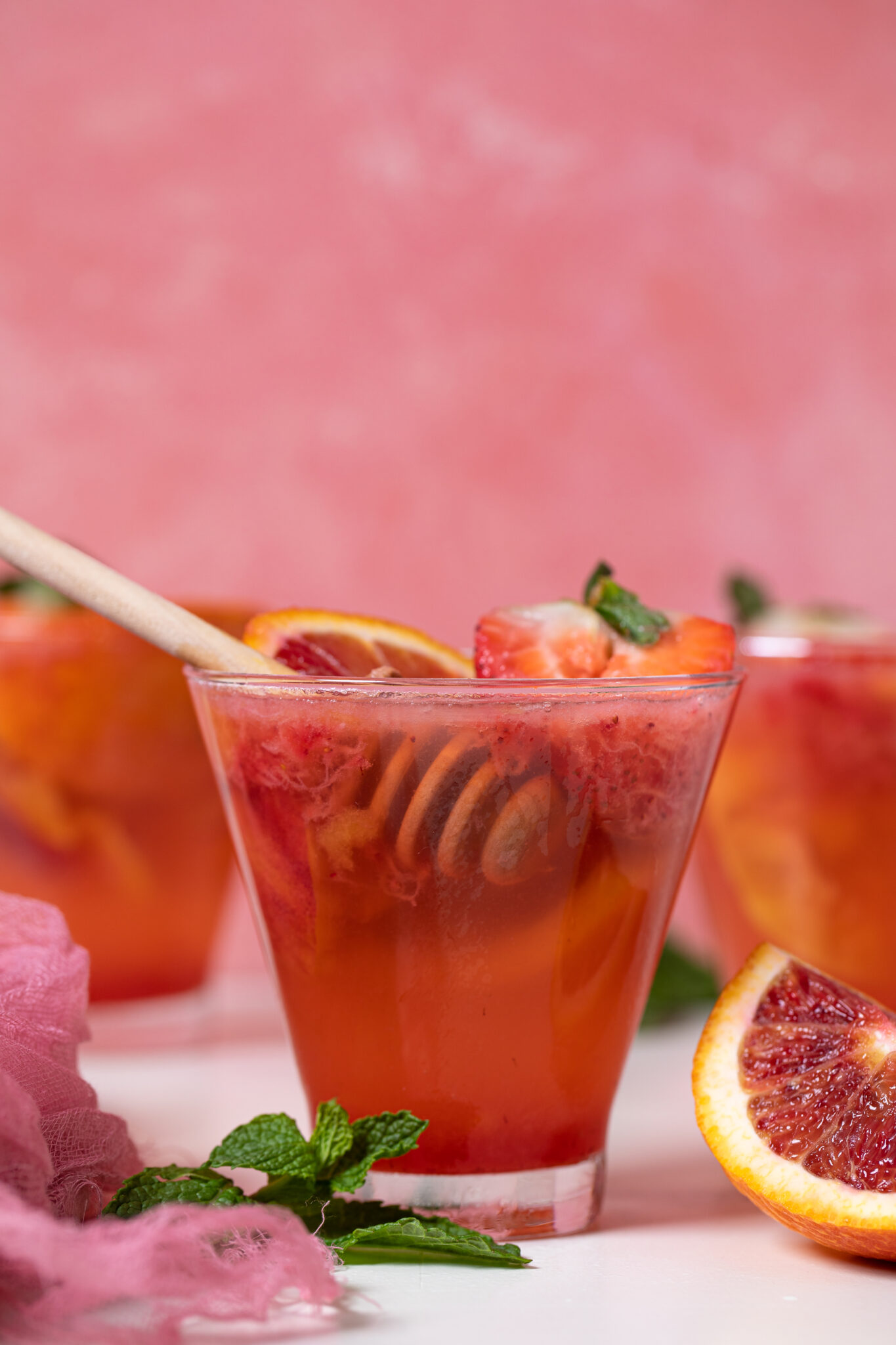 Small glass of Blood Orange Strawberry Ginger Mocktail.