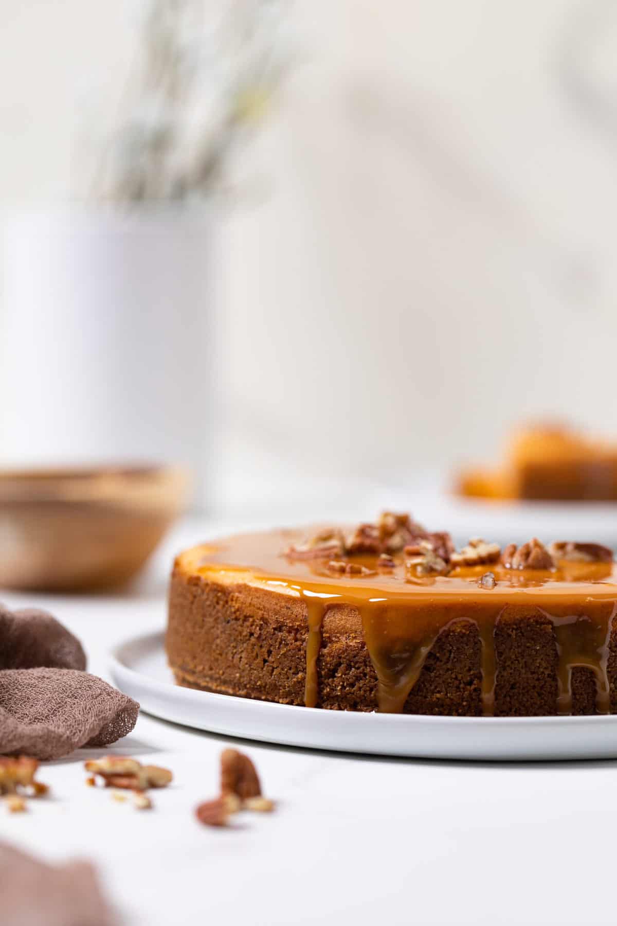 Sweet Potato Caramel Cheesecake on a white plate