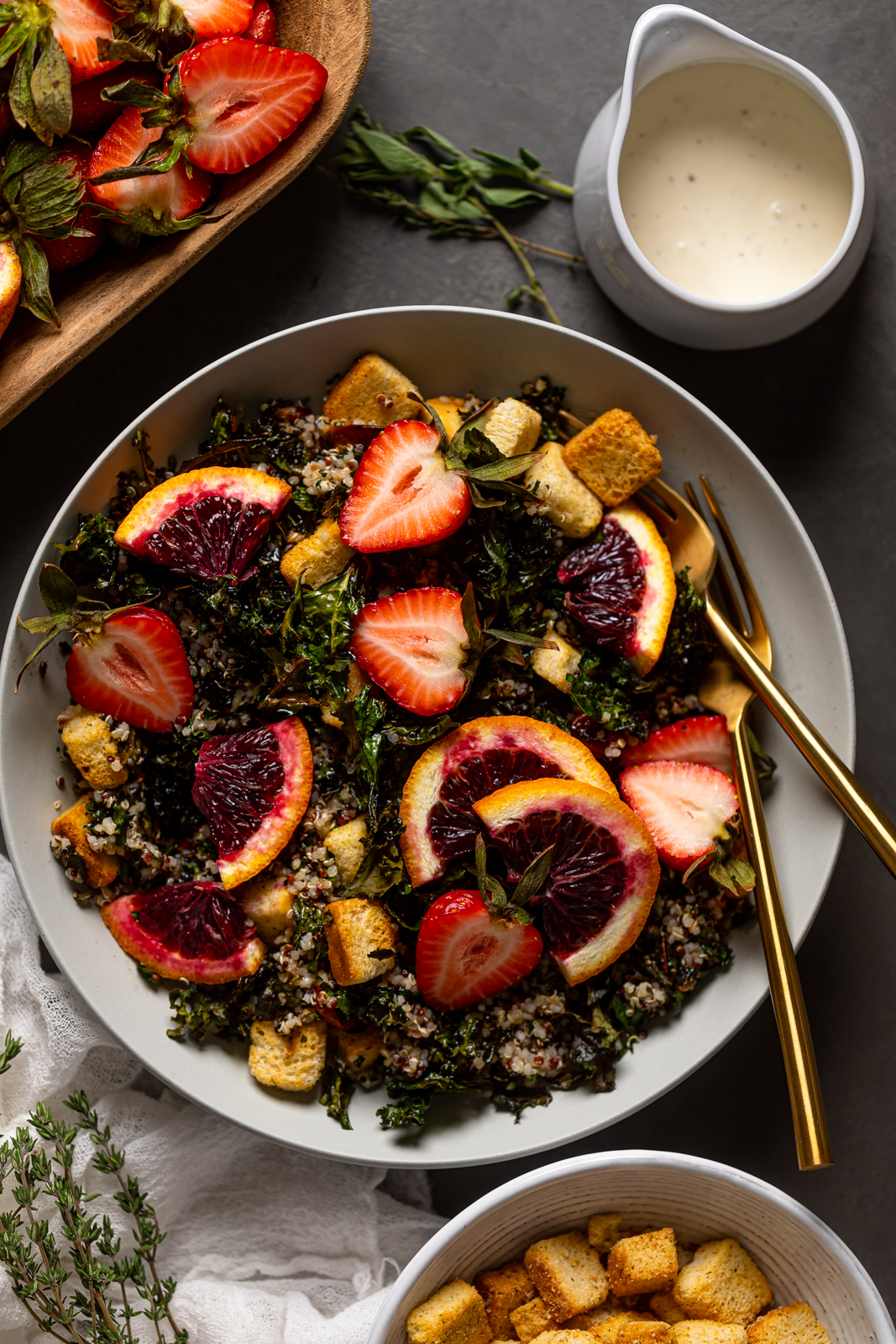 Bowl of Blood Orange Kale Salad with two forks